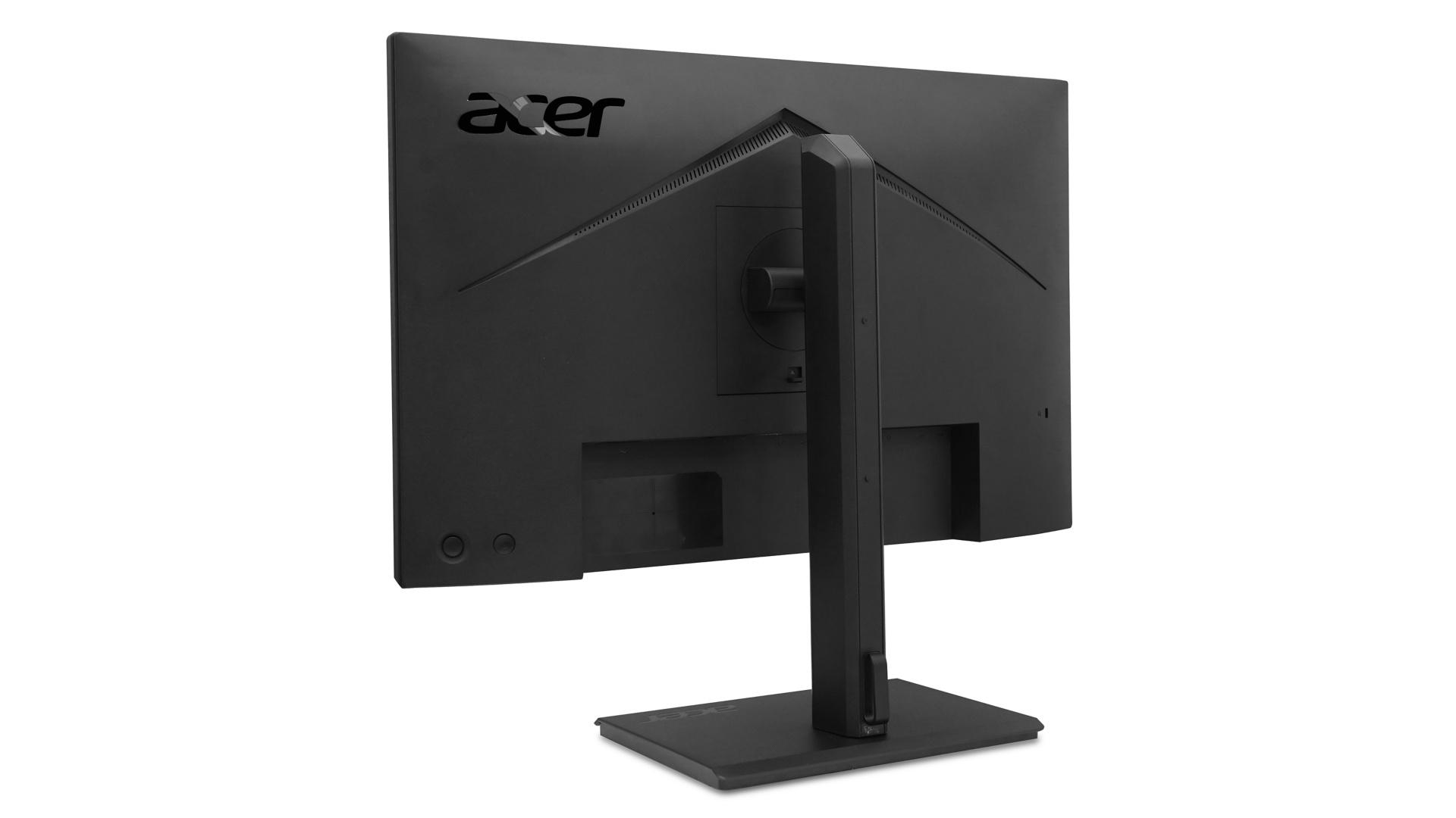 Rear view of a black Acer monitor on a white background, showing stand and ports.