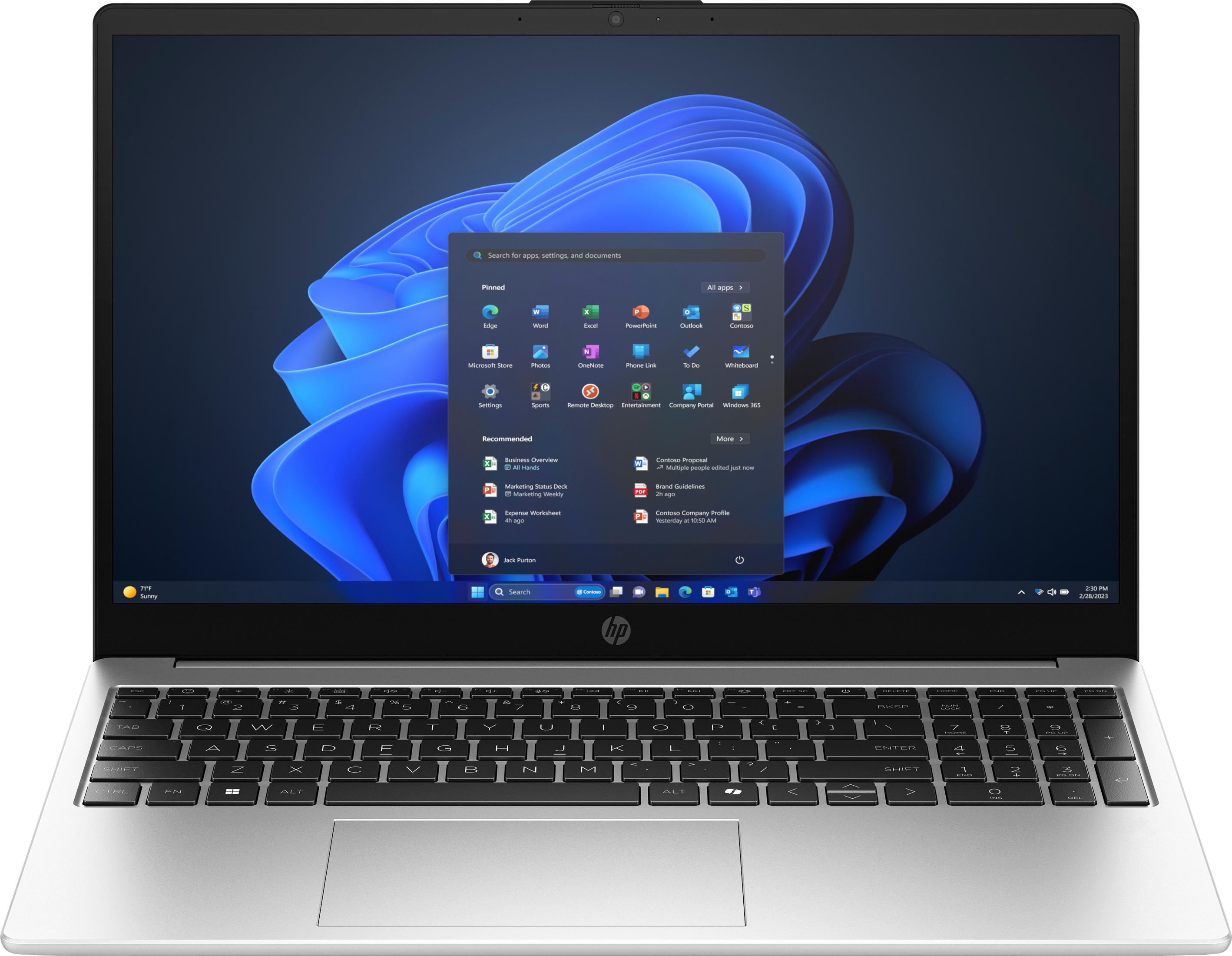 Ein silberner HP Laptop mit Windows 11 Startmenü und blauer Wellen-Hintergrundgrafik.