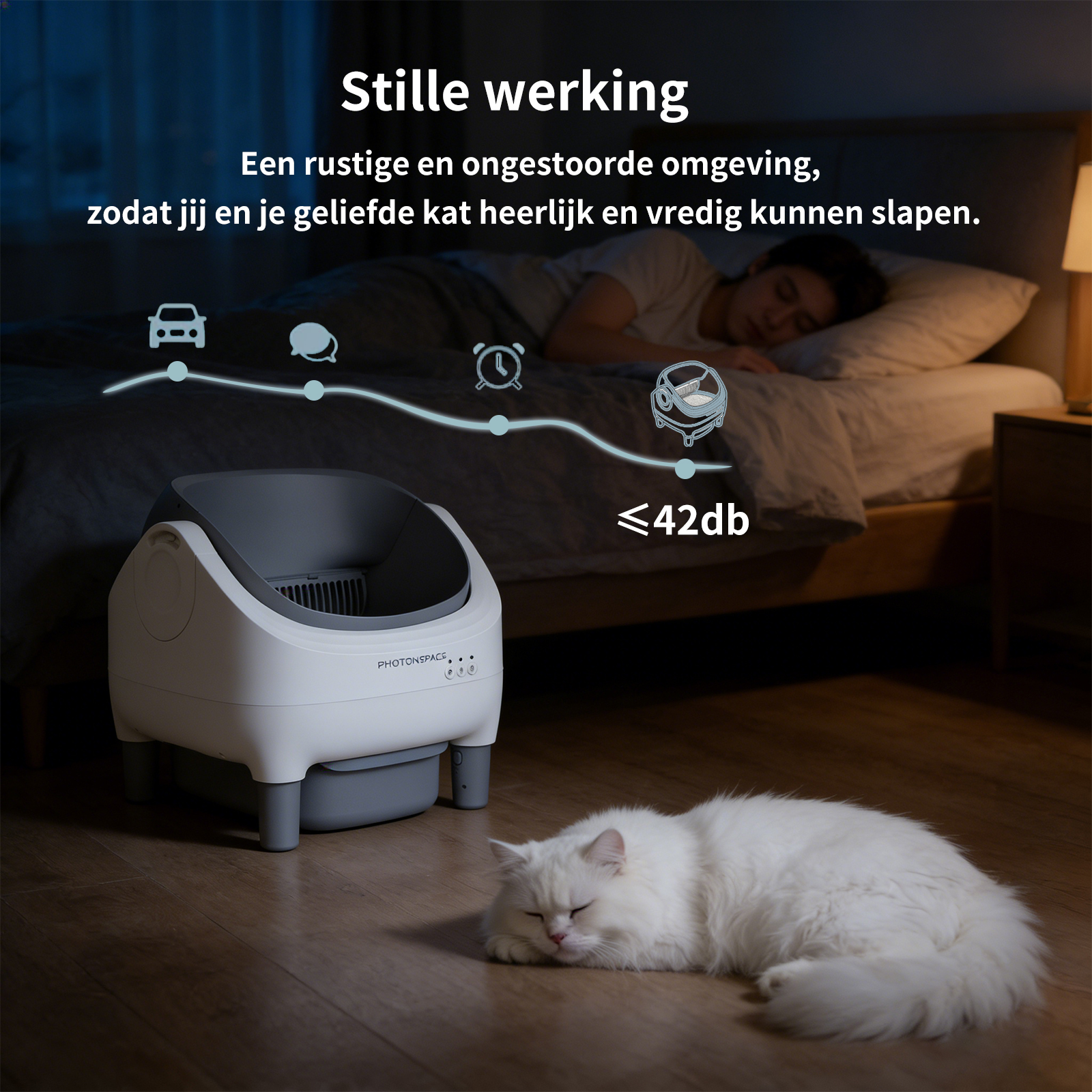Een kat slaapt op de vloer naast een automatische kattenbak.