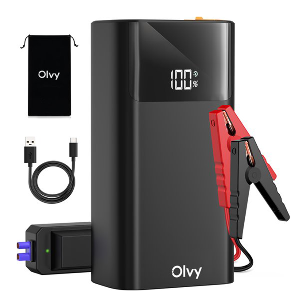 Zwarte powerbank met 100% display, kabels, tas en startkabels.