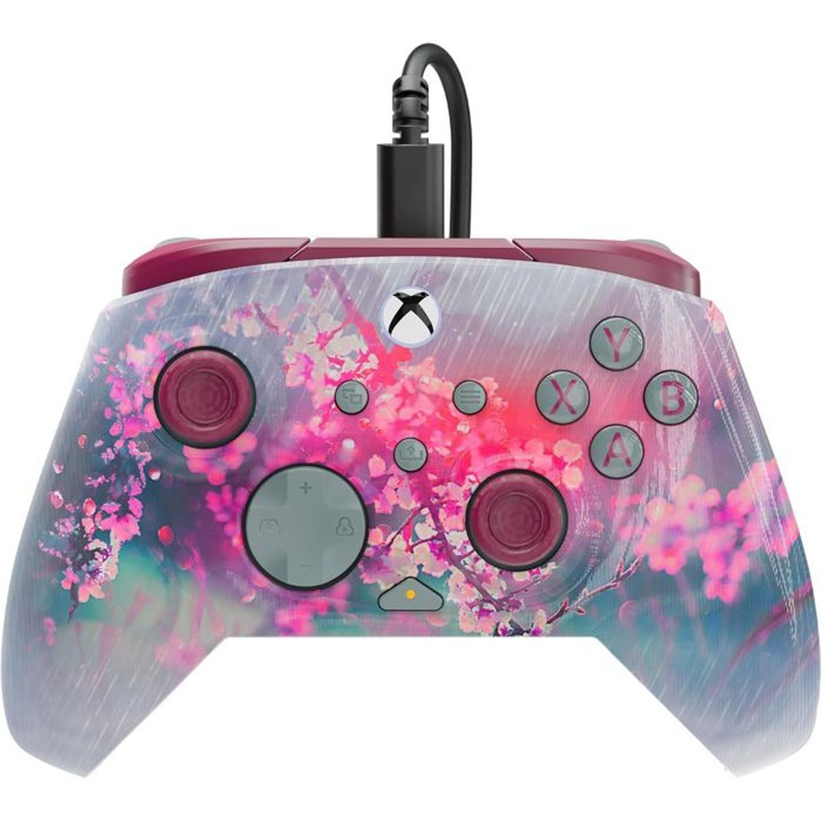 Ein Xbox-Controller mit Kirschblütenmuster und grauen Tasten.