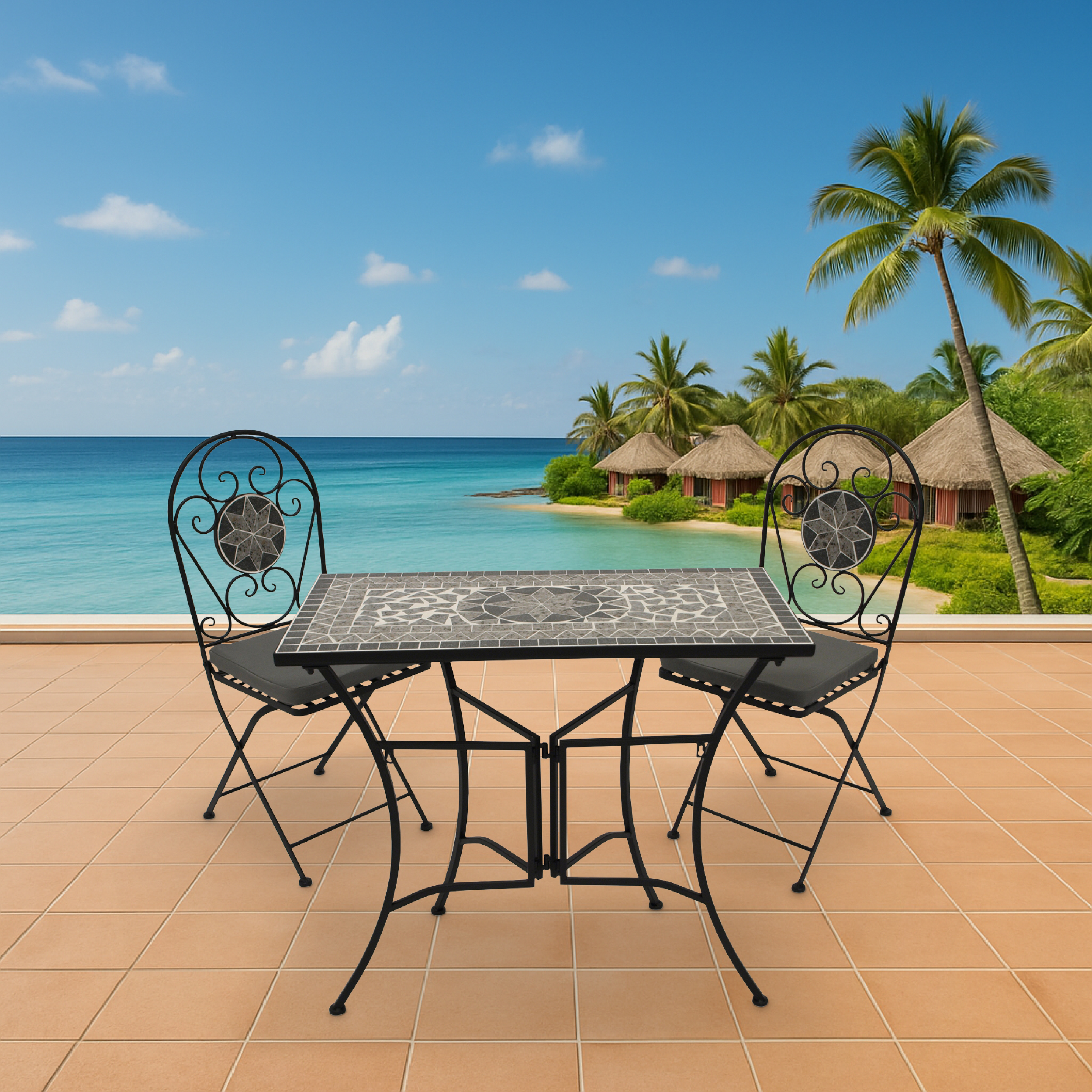 Ein Tisch und zwei Stühle auf einer Terrasse mit Blick auf das Meer und Bungalows.
