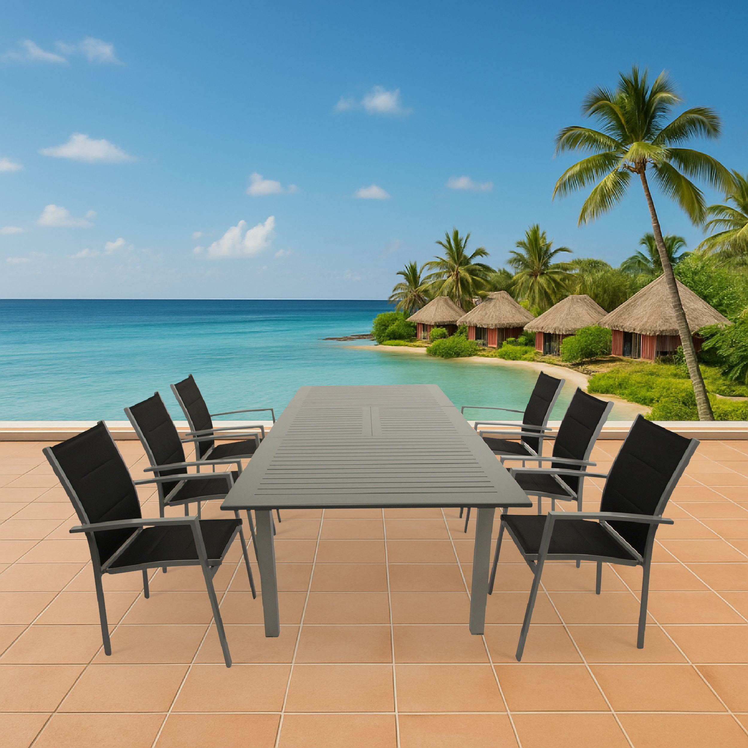 Esstisch mit sechs schwarzen Stühlen auf einer Terrasse mit Blick auf das Meer und Hütten.