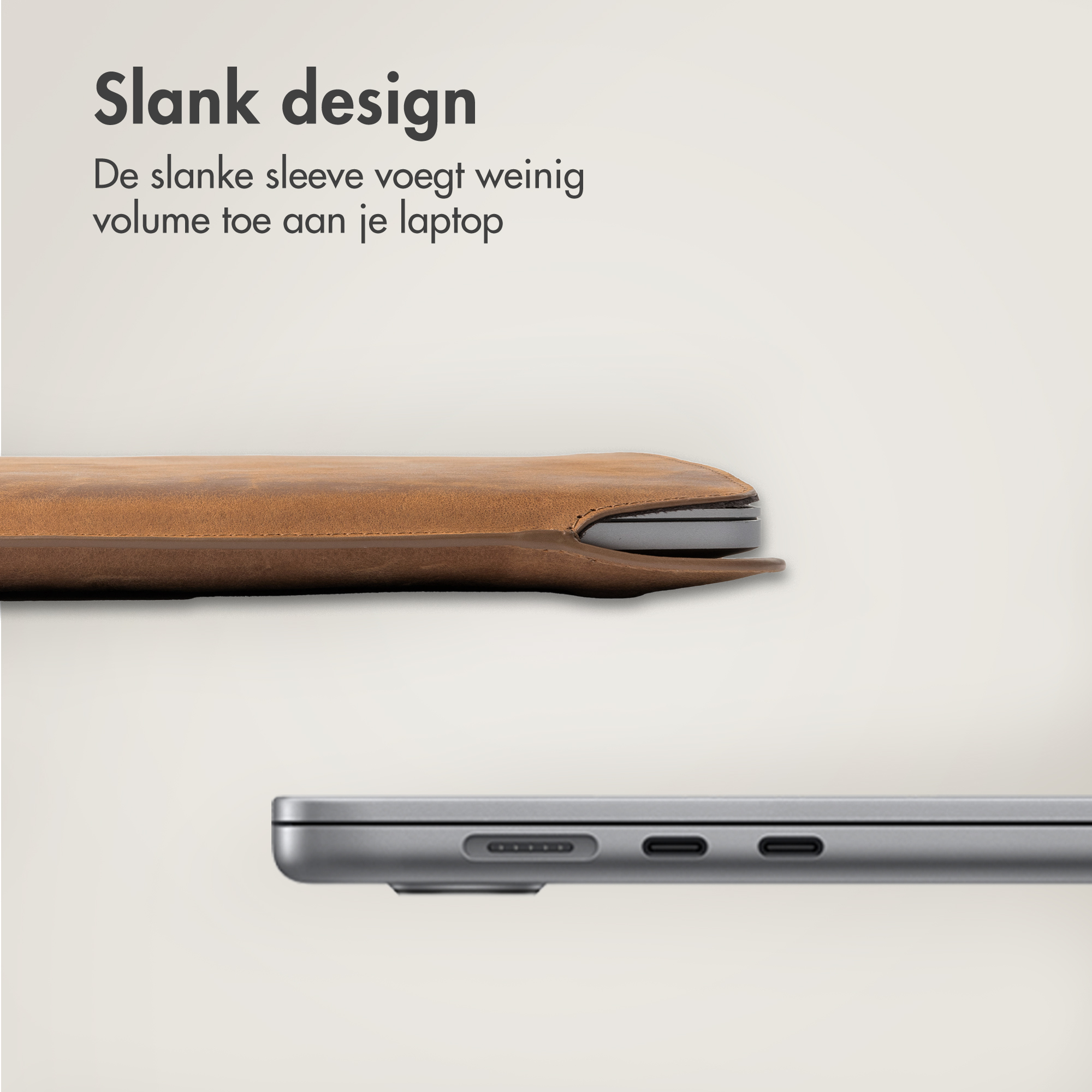 A brown leather sleeve holding a metallic laptop.