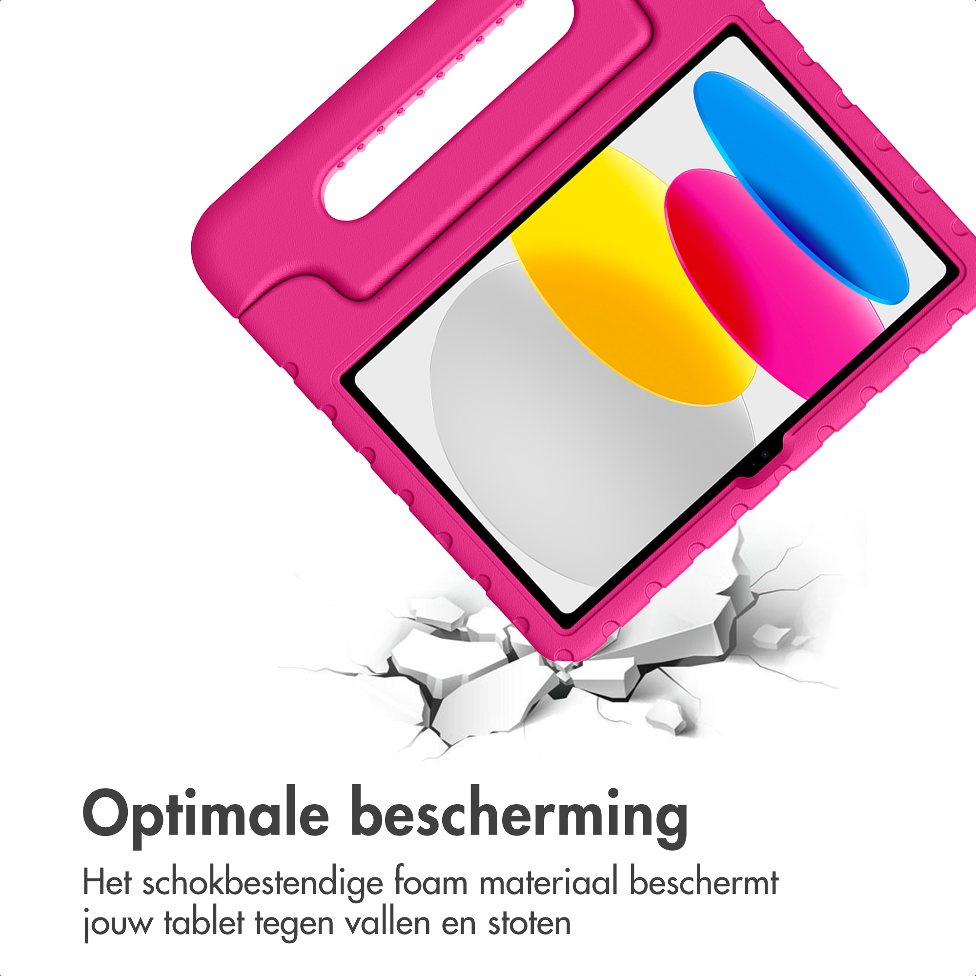 Een roze tablethoes met handvat, vallend op gebarsten grond.