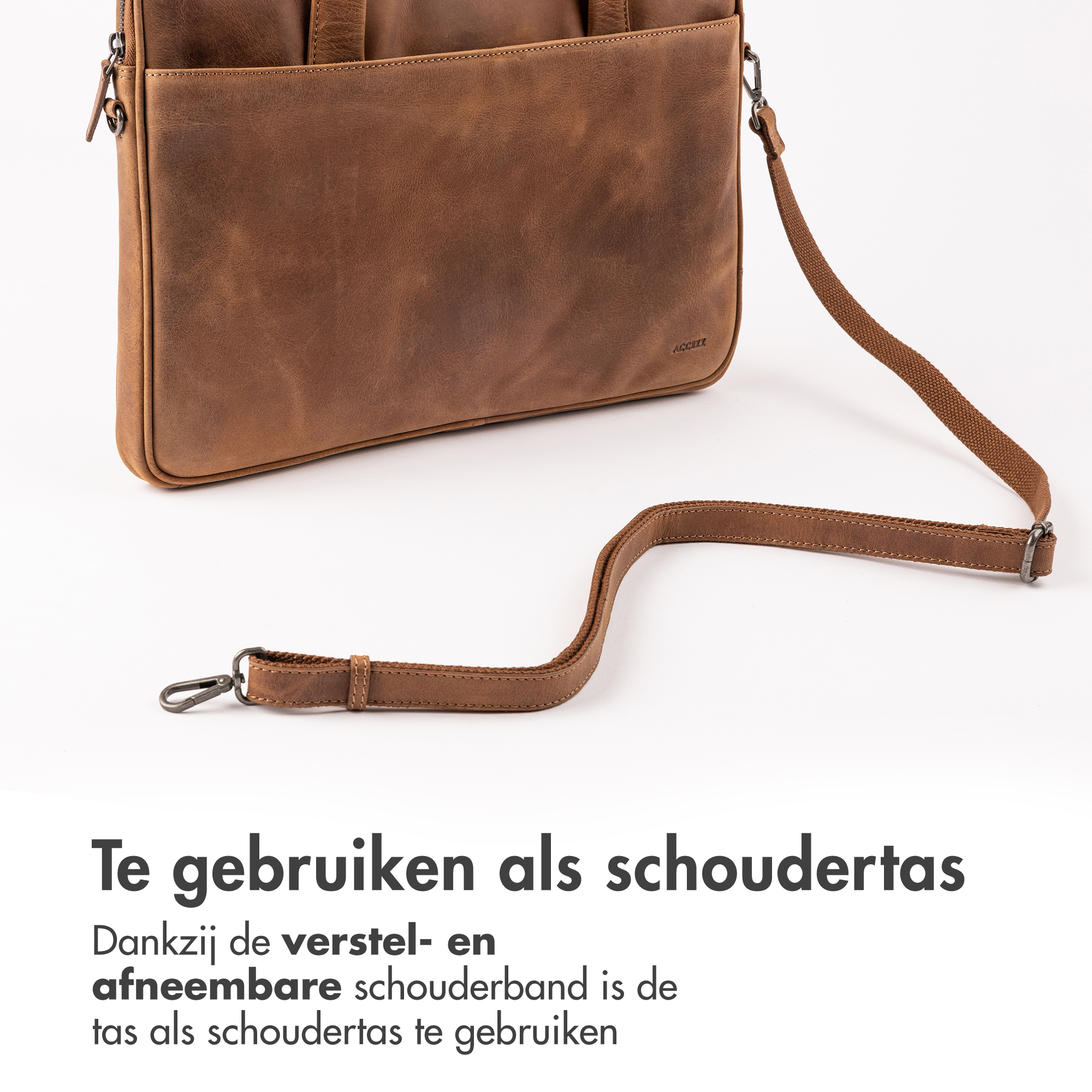 Brown leather bag with detachable strap.