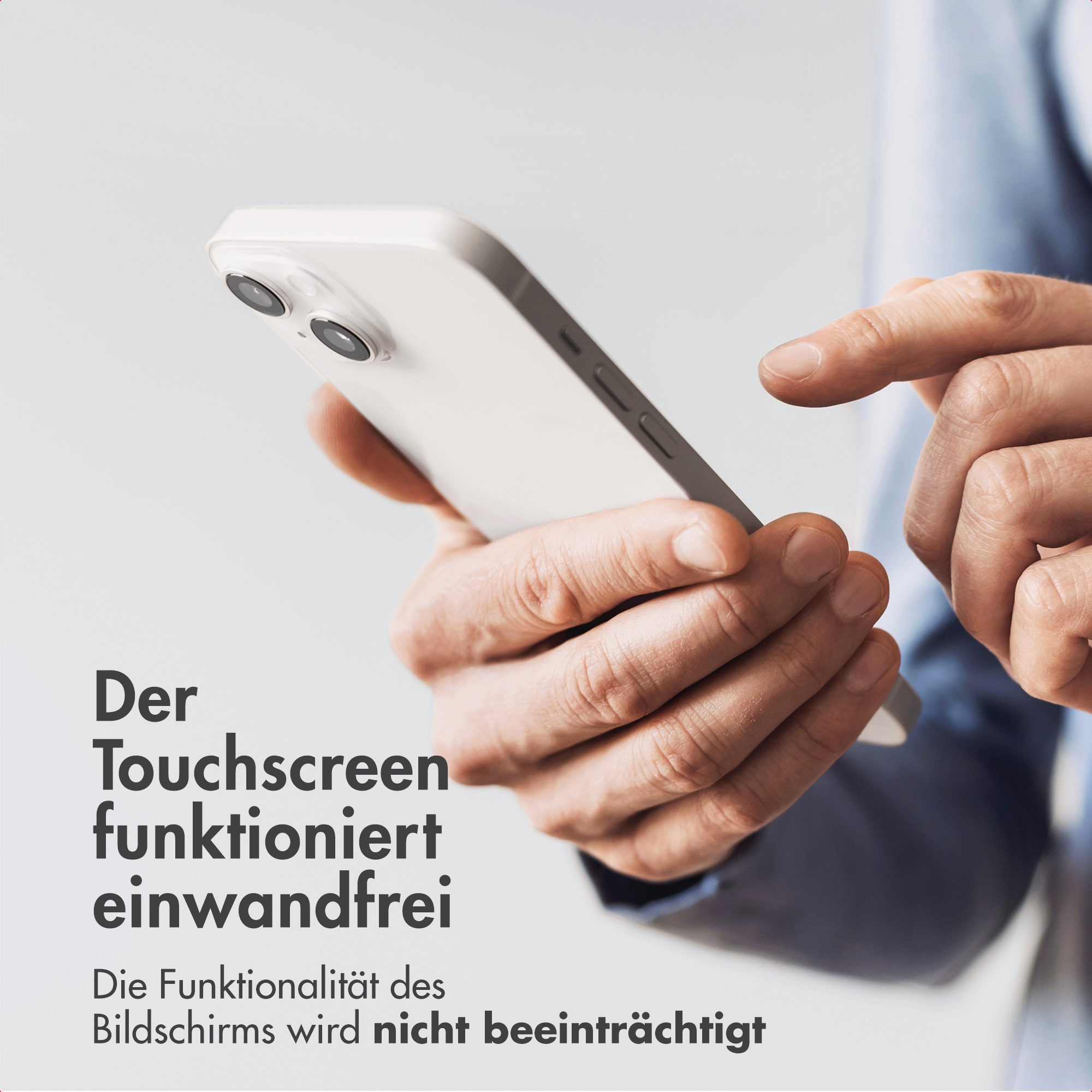 Man holding a phone, focus on touchscreen functionality. Bright background.