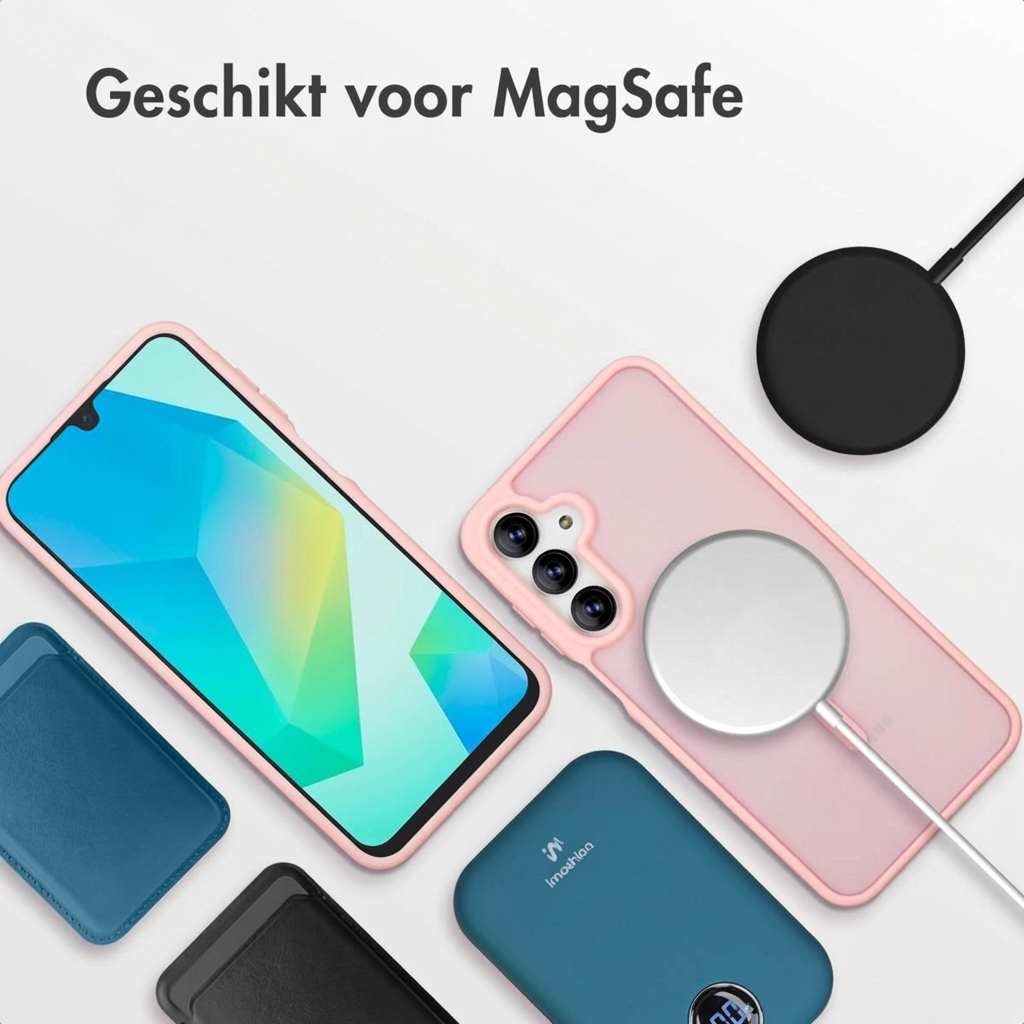 Uno smartphone con custodia rosa, accessori e caricabatterie MagSafe.