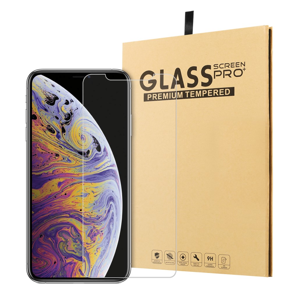 Un smartphone avec un écran coloré à côté d'un emballage de protection d'écran.