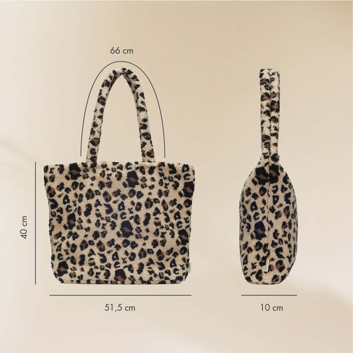 A fluffy leopard print tote bag, dimensions 51.5x40x10 cm, handle 66 cm.