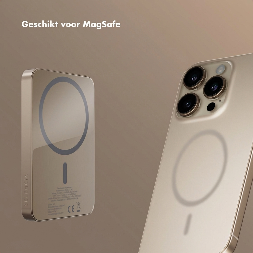 Gouden iPhone en MagSafe lader op beige achtergrond.