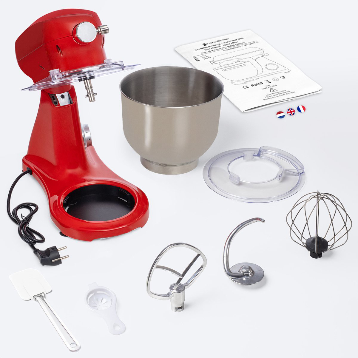 Rode keukenmachine met accessoires en handleiding op witte achtergrond.