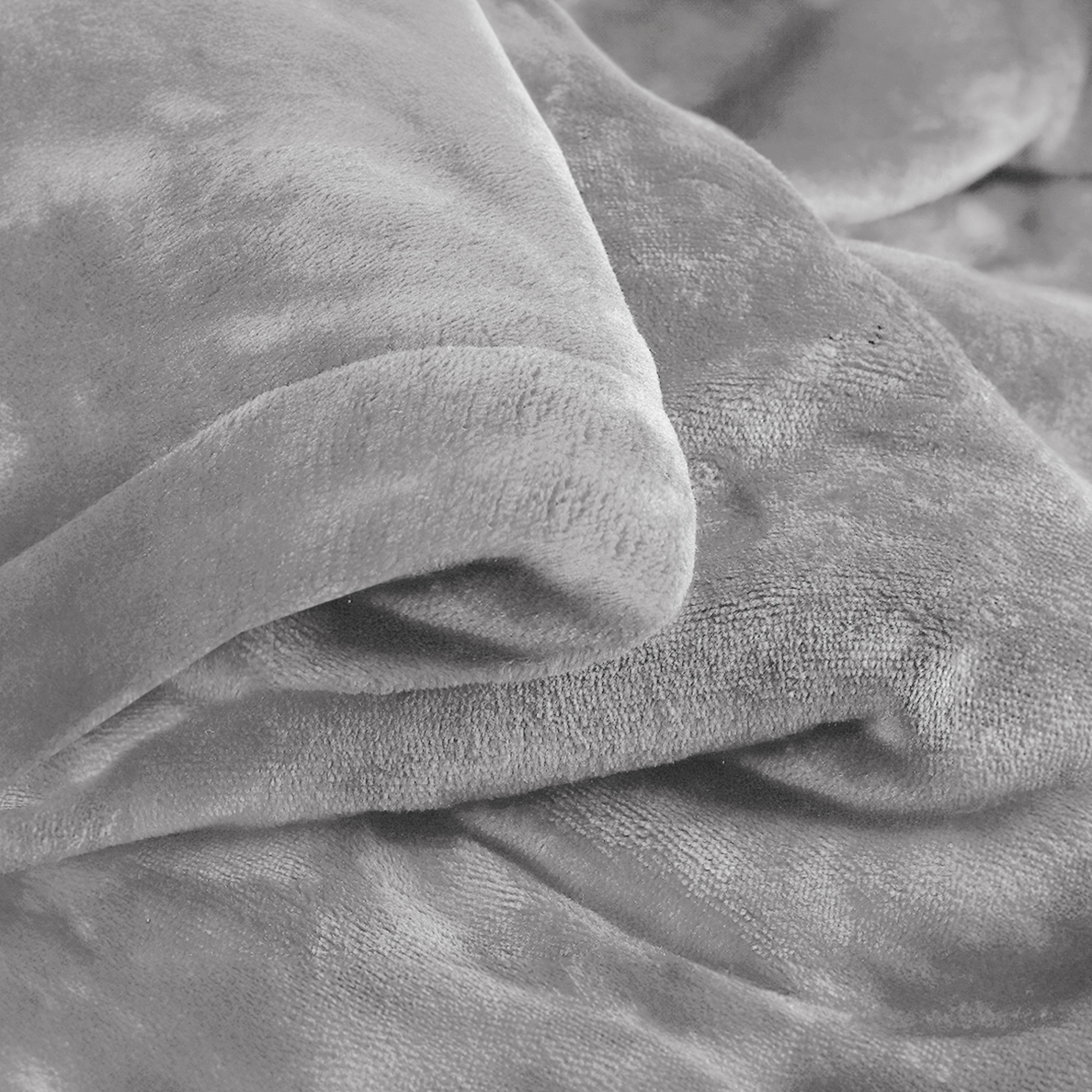 Gray soft fabric detail with folds and texture.