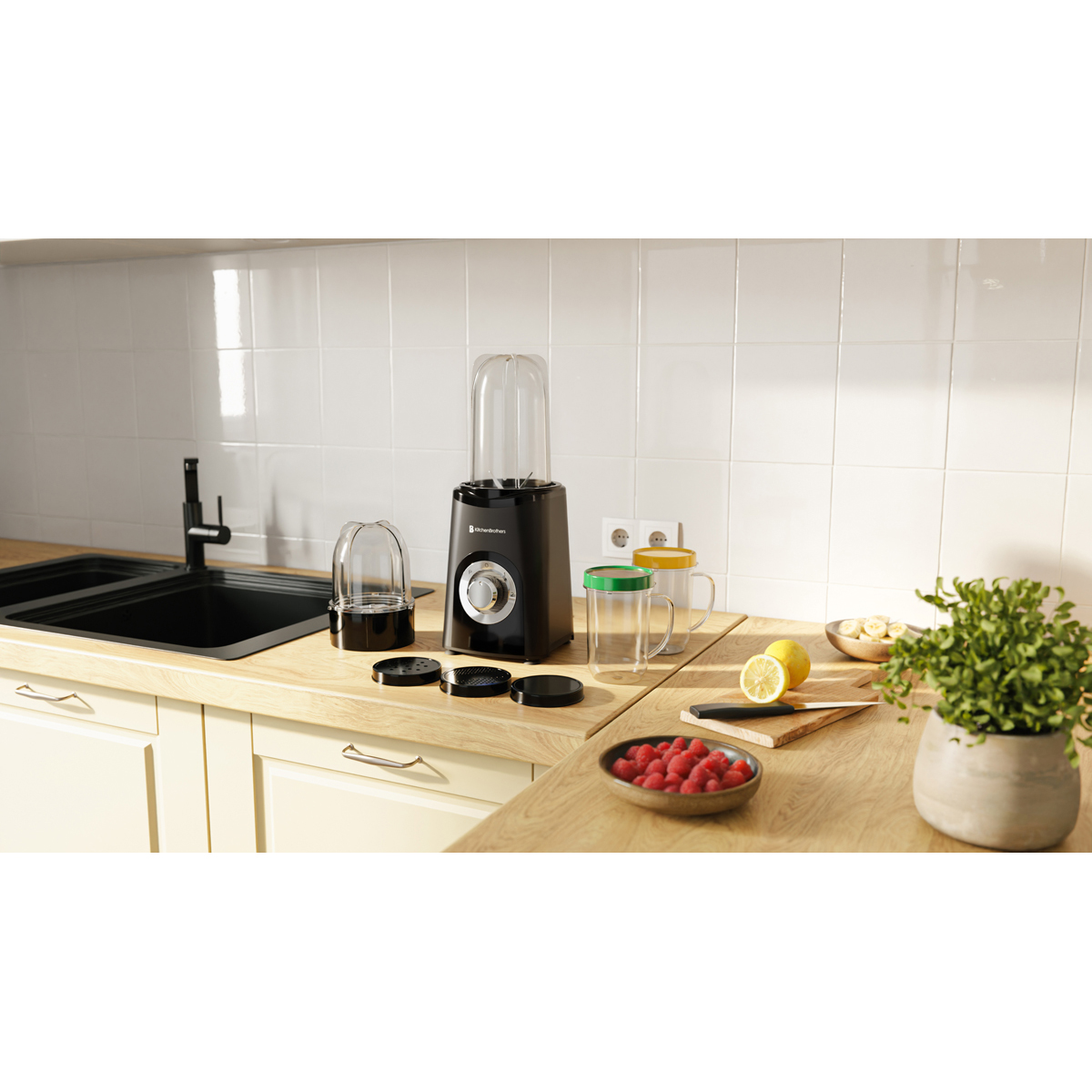 A black blender sits on a wooden counter by a sink, with fruit and cups nearby.