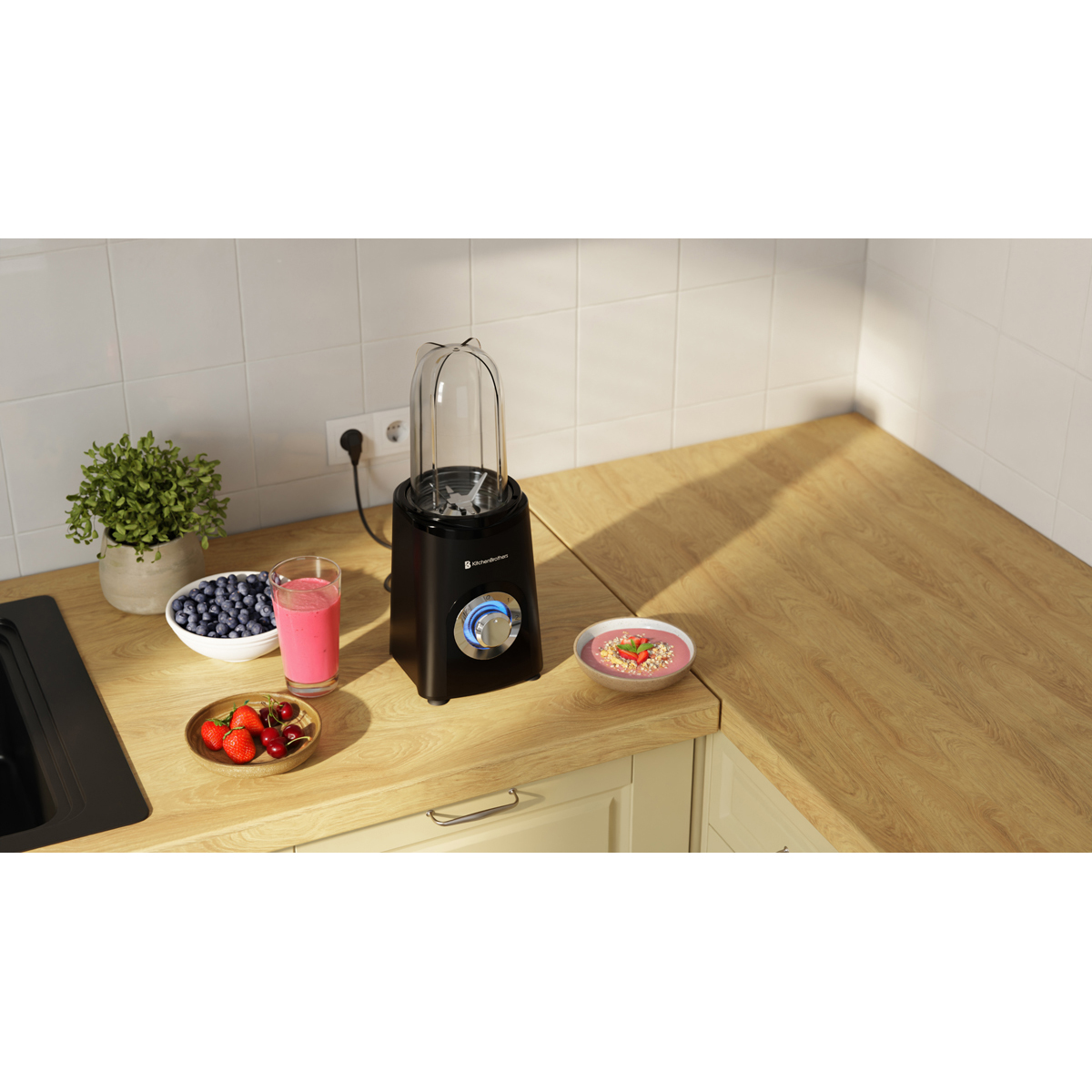 Black blender with berries, smoothie, and fruit bowl on a wooden countertop.
