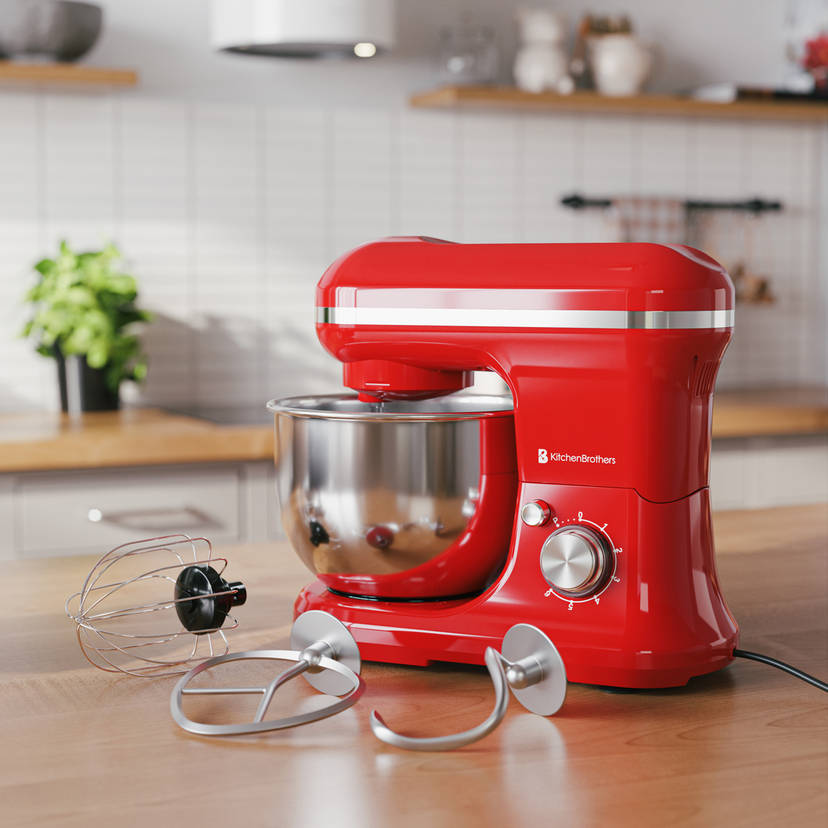 Een rode standmixer met metalen kom staat op een houten aanrecht. Accessoires in de buurt.