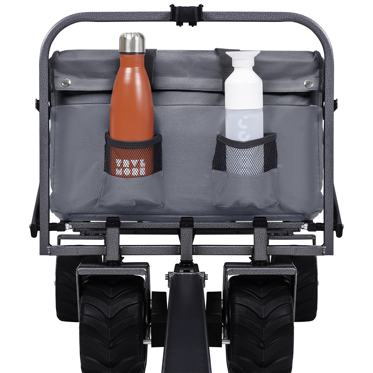 A gray wagon with two water bottles, one red, one white, and large wheels.