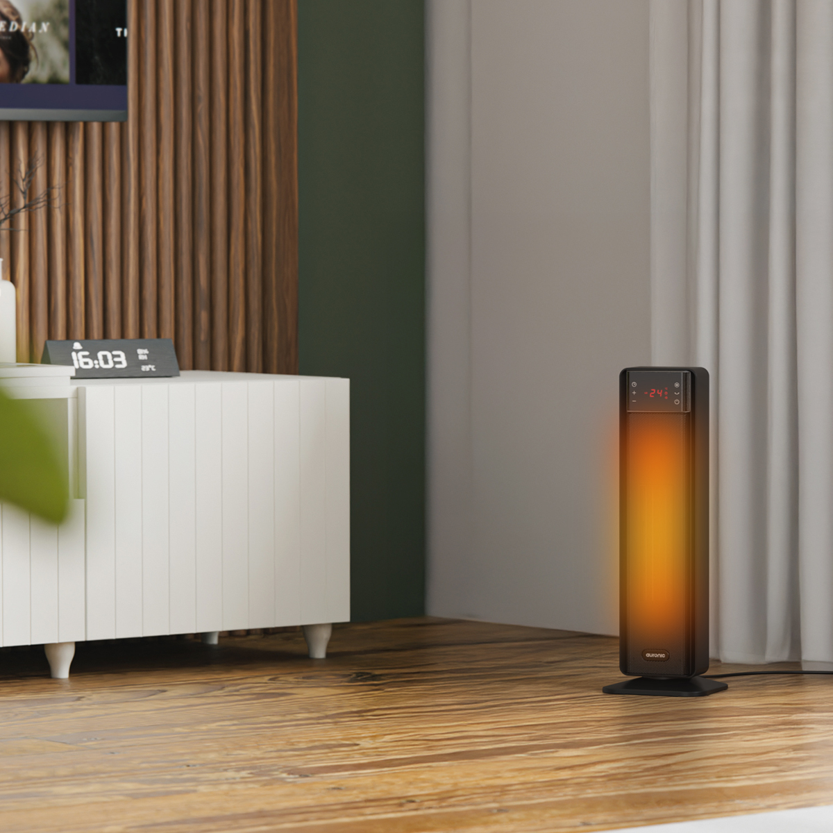 Een zwarte elektrische kachel met oranje gloed staat op een houten vloer naast een witte kast.