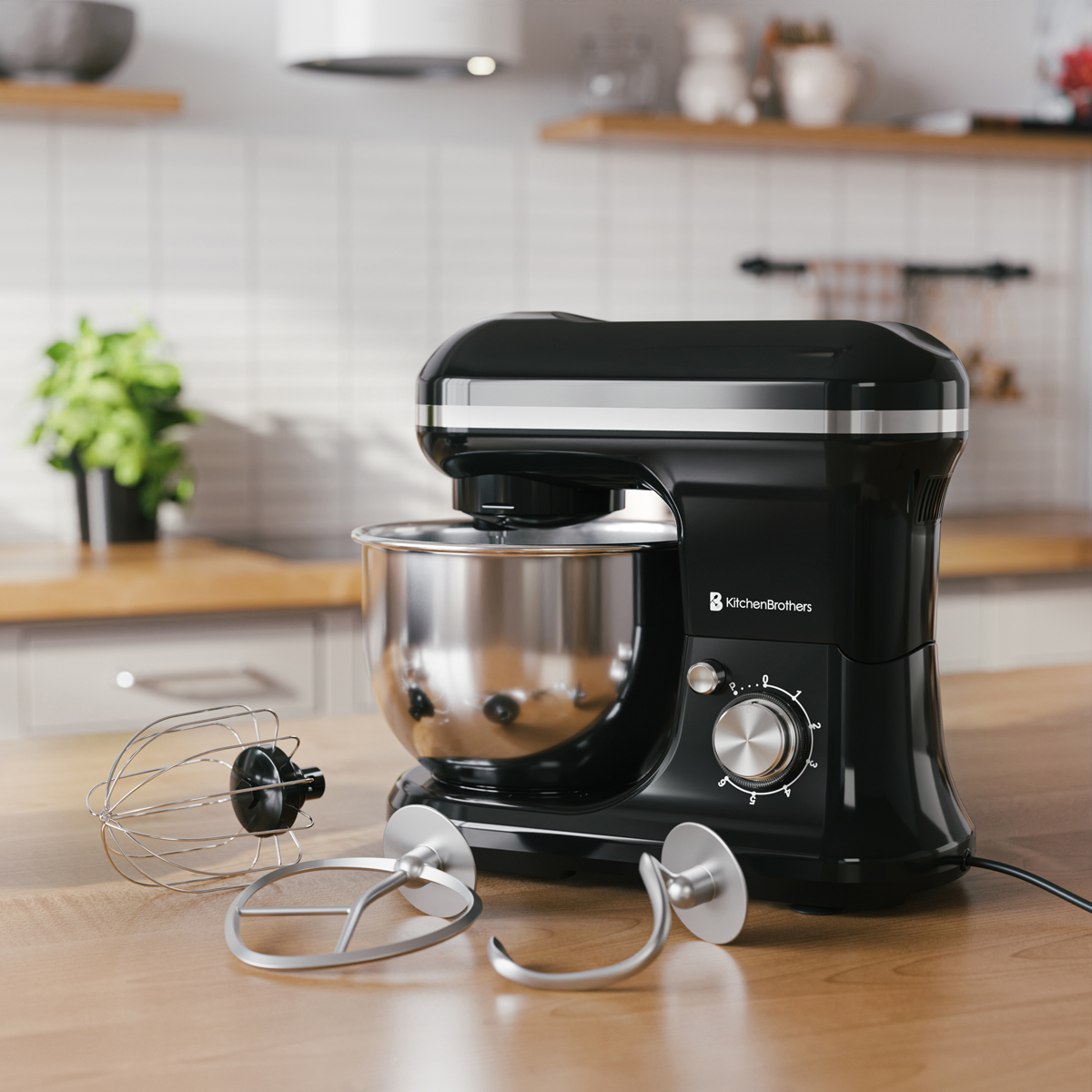 Zwarte keukenmixer met roestvrijstalen kom en accessoires op houten tafel.