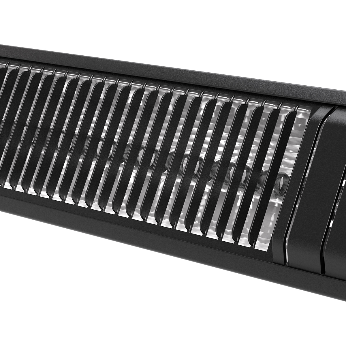 Close-up van een zwarte LED-lichtbalk met schuine lamellen over de lampen.