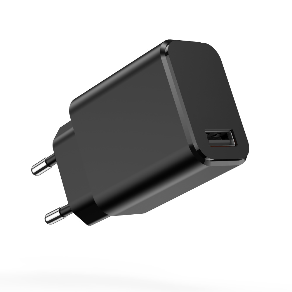 Spina caricatore USB nera con due poli e una porta USB.