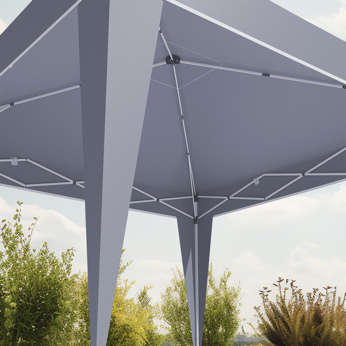 Gray canopy with metal frame above trees and sky.