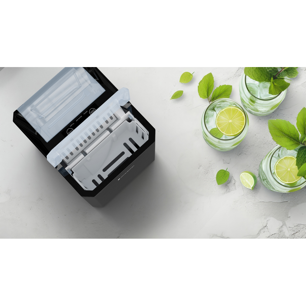 Black ice maker with open lid next to three glasses of drinks with lime and mint.
