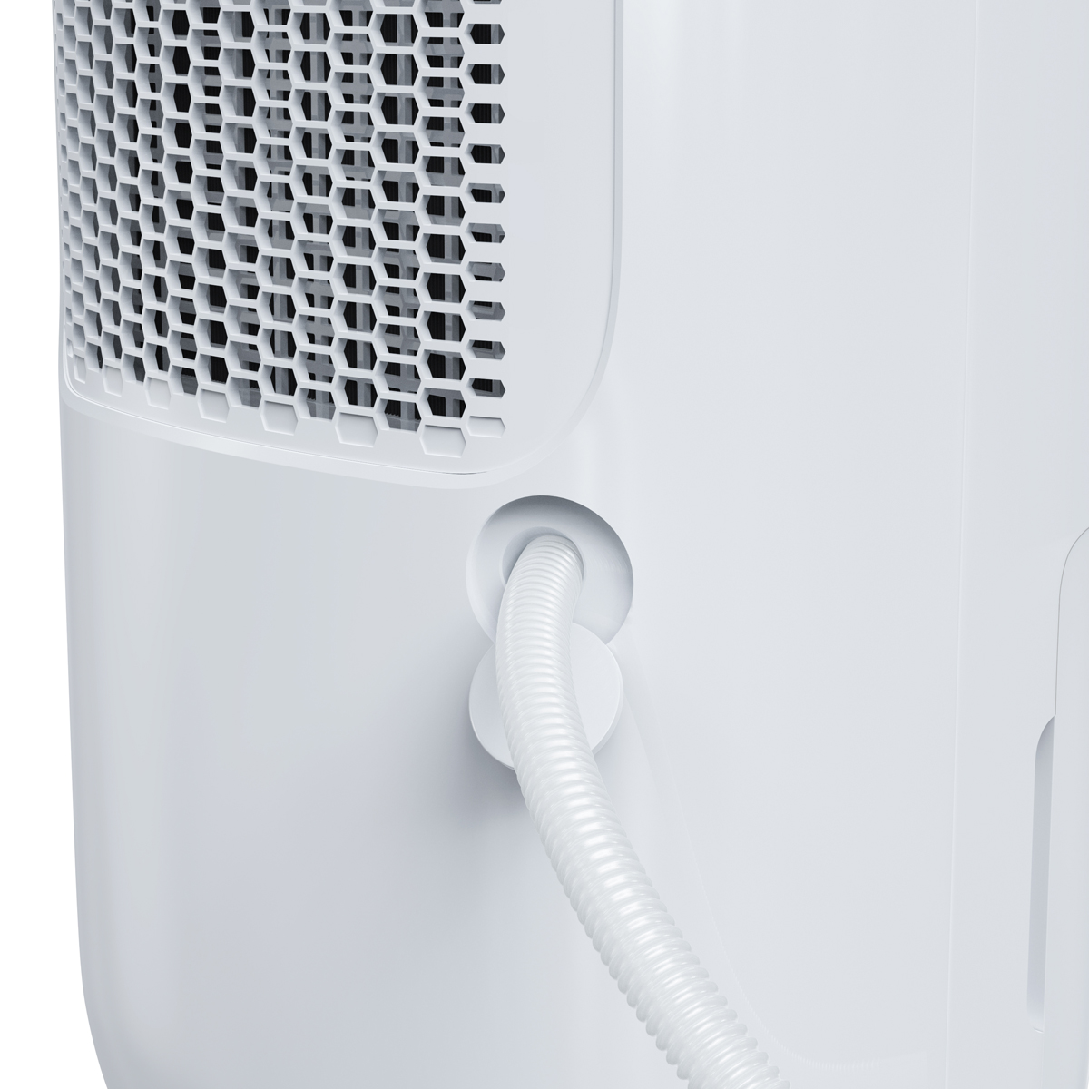 Een witte slang is bevestigd aan een ventilatierooster en een ronde poort.