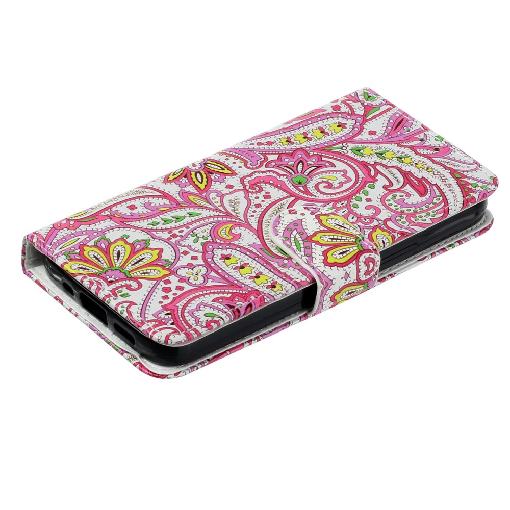 Ein weißes Handyhülle mit einem auffälligen rosa und gelben Paisleymuster.
