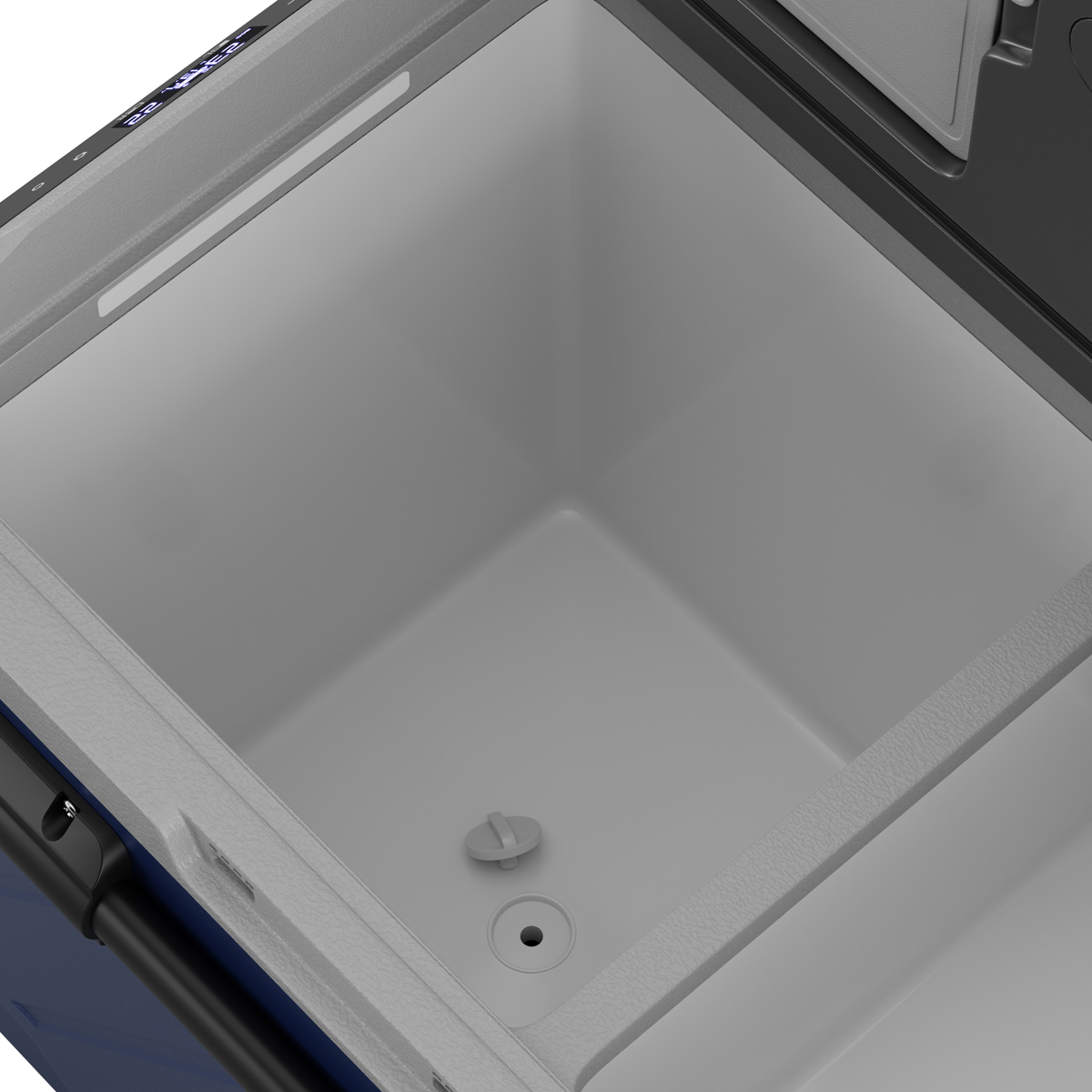 Interieur van een blauwe koelbox met witte inzet en aftapplug.