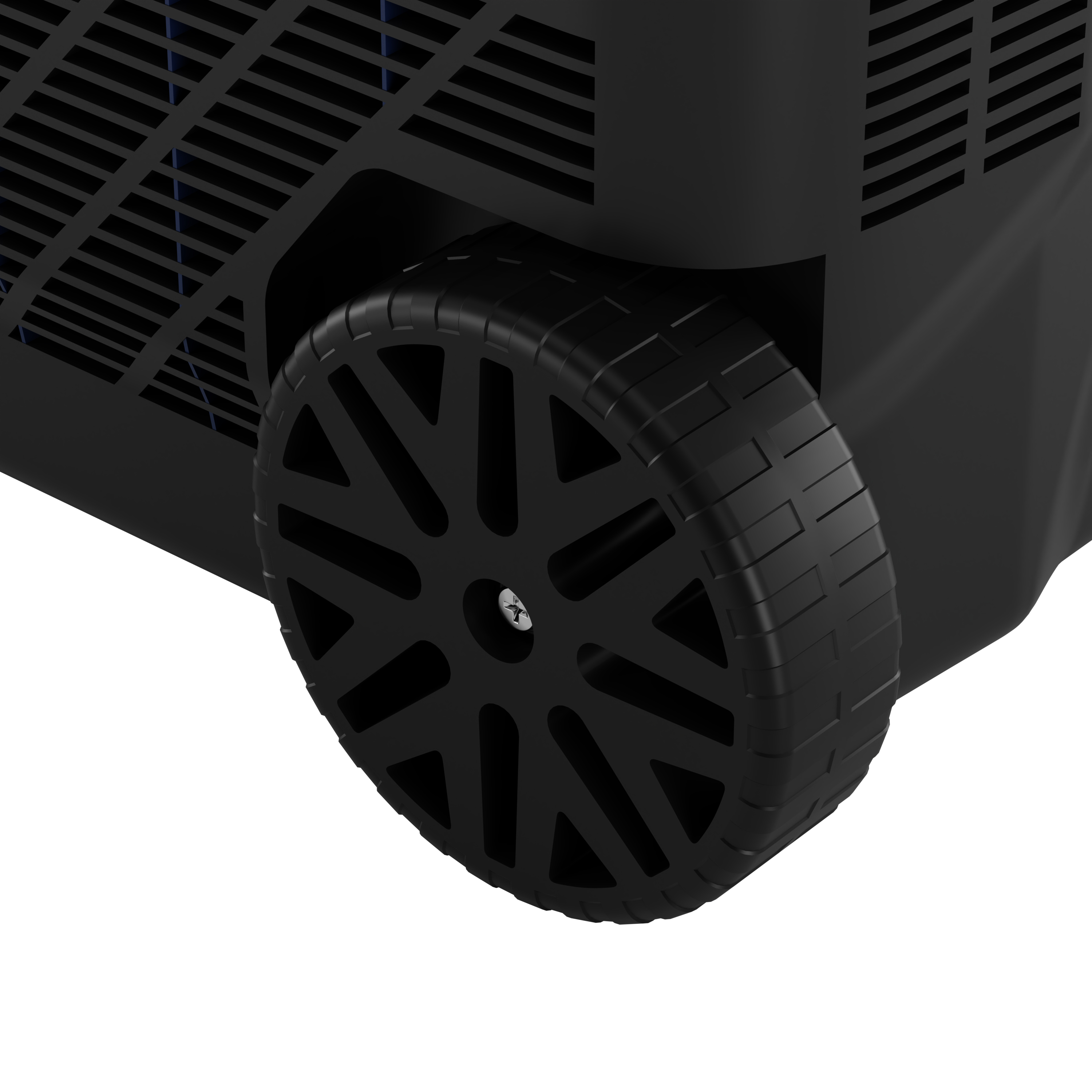 Close-up van een zwart wiel met open ontwerp op een apparaat met ventilatiesleuven.