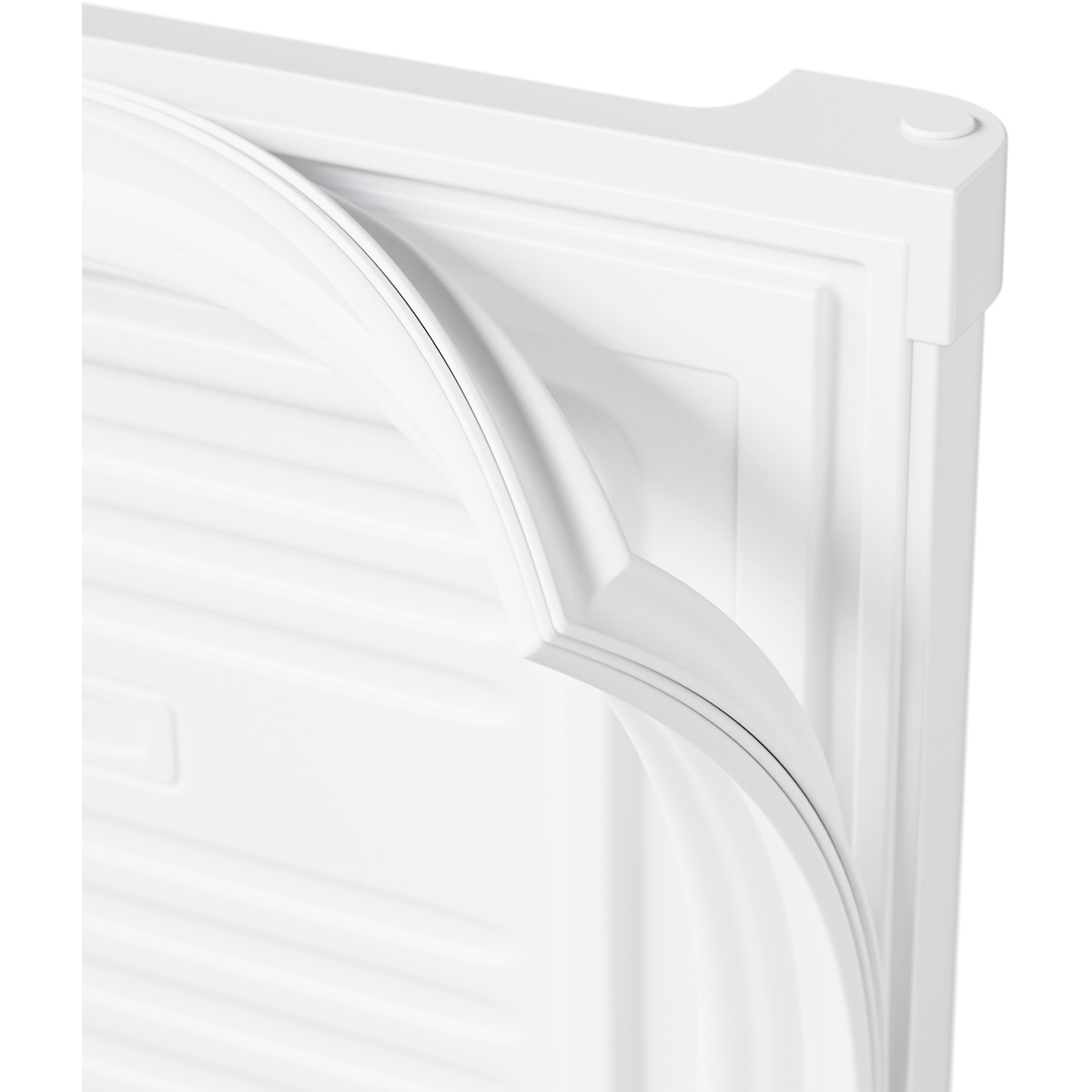 Close-up of a white rubber seal on a refrigerator door.