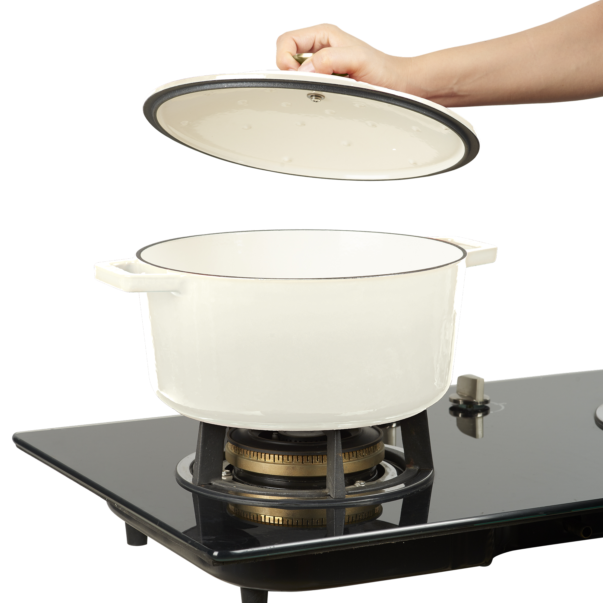 A hand lifts a cream-colored lid off a pot on a black gas stove.