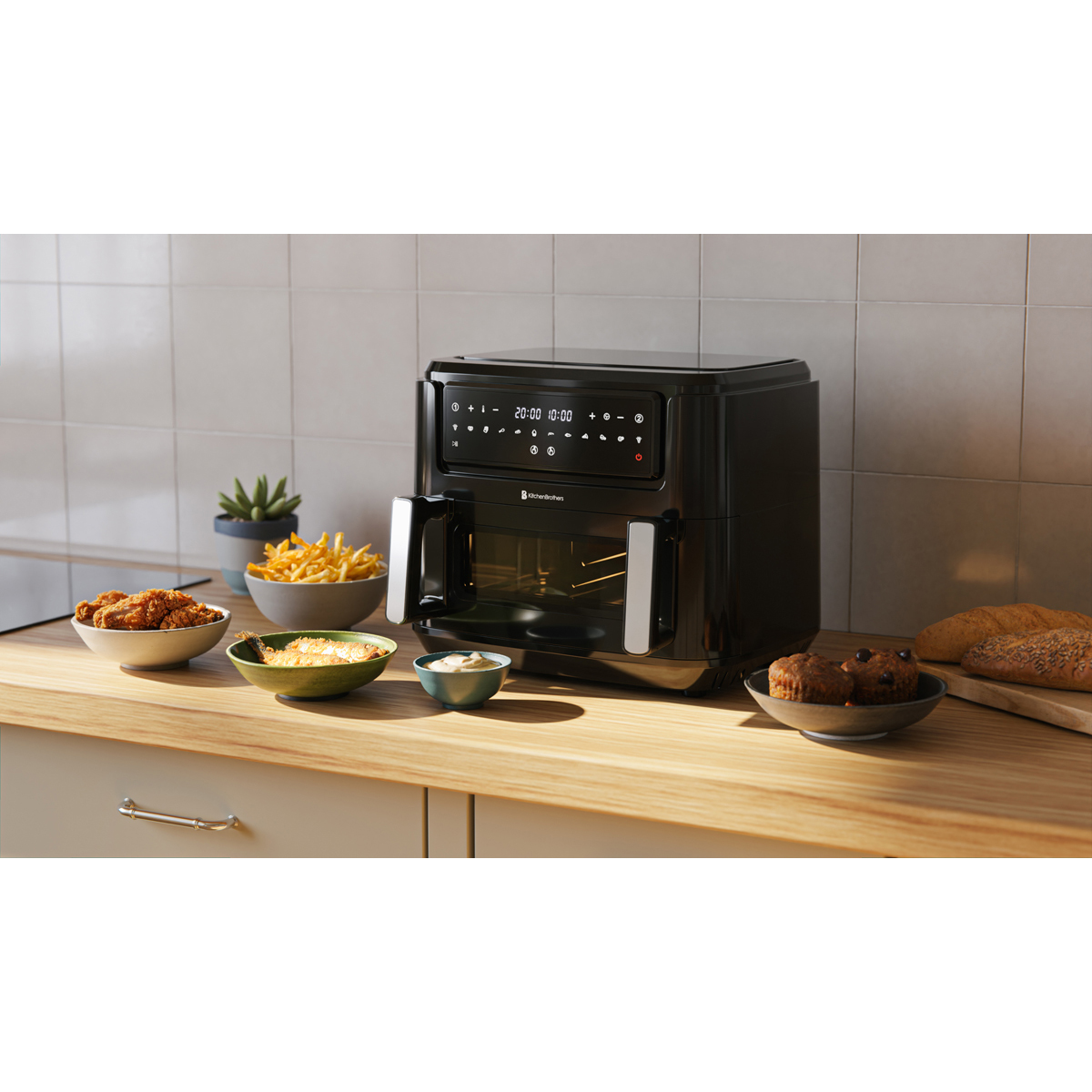 A black air fryer sits on a countertop with chicken, fries, and bread.