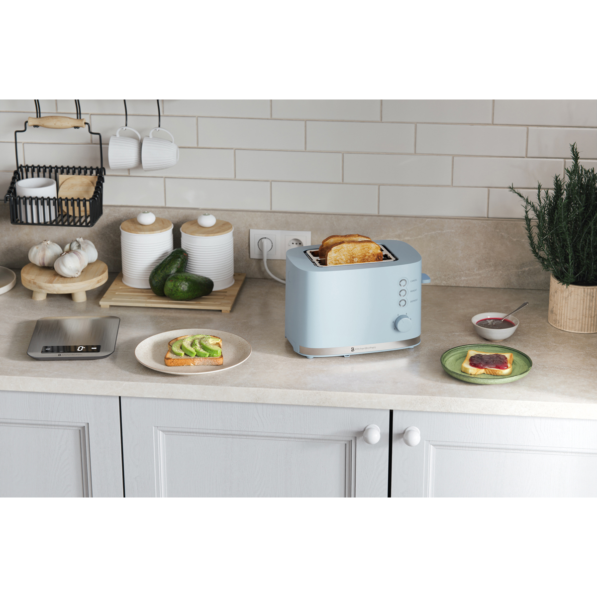 A light blue toaster with toast, avocado toast, and jam toast on a kitchen counter.