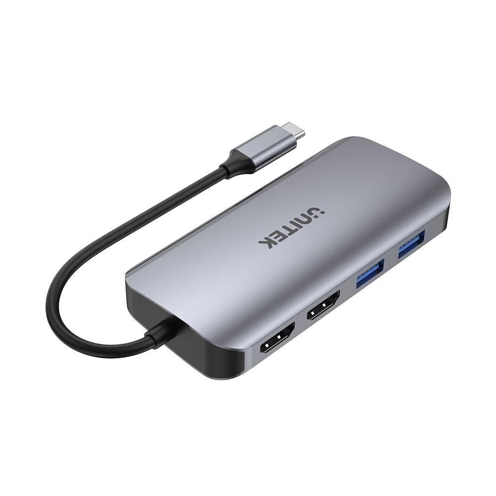 Szary hub USB-C z portami HDMI i USB oraz kablem.