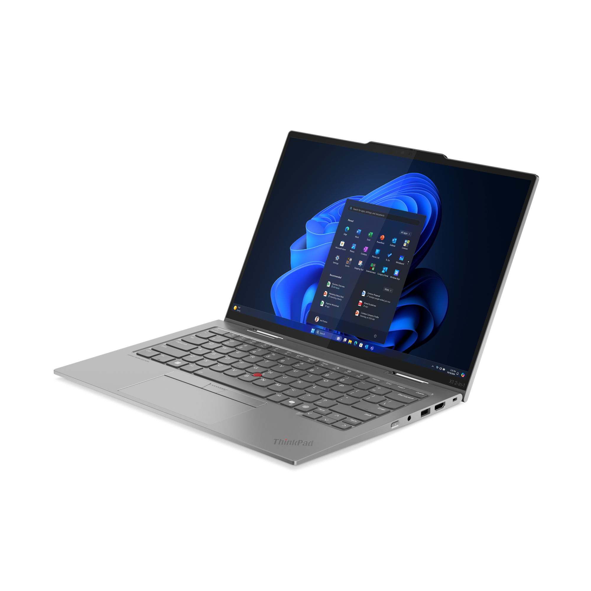 Srebrny laptop z otwartym ekranem, wyświetlający system Windows 11. Klawiatura i touchpad są widoczne.