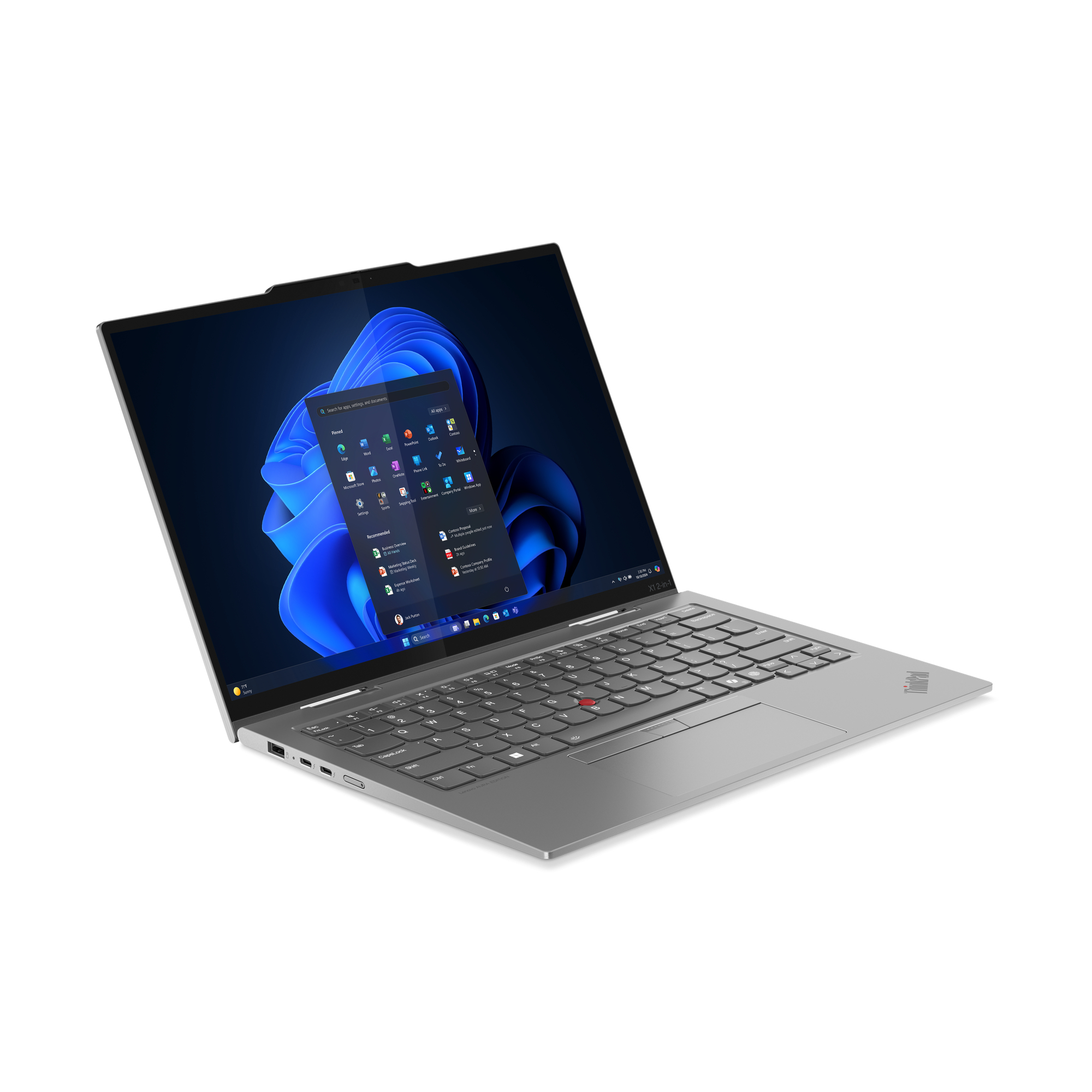 Srebrny laptop z otwartym ekranem, wyświetlający menu Start systemu Windows 11.