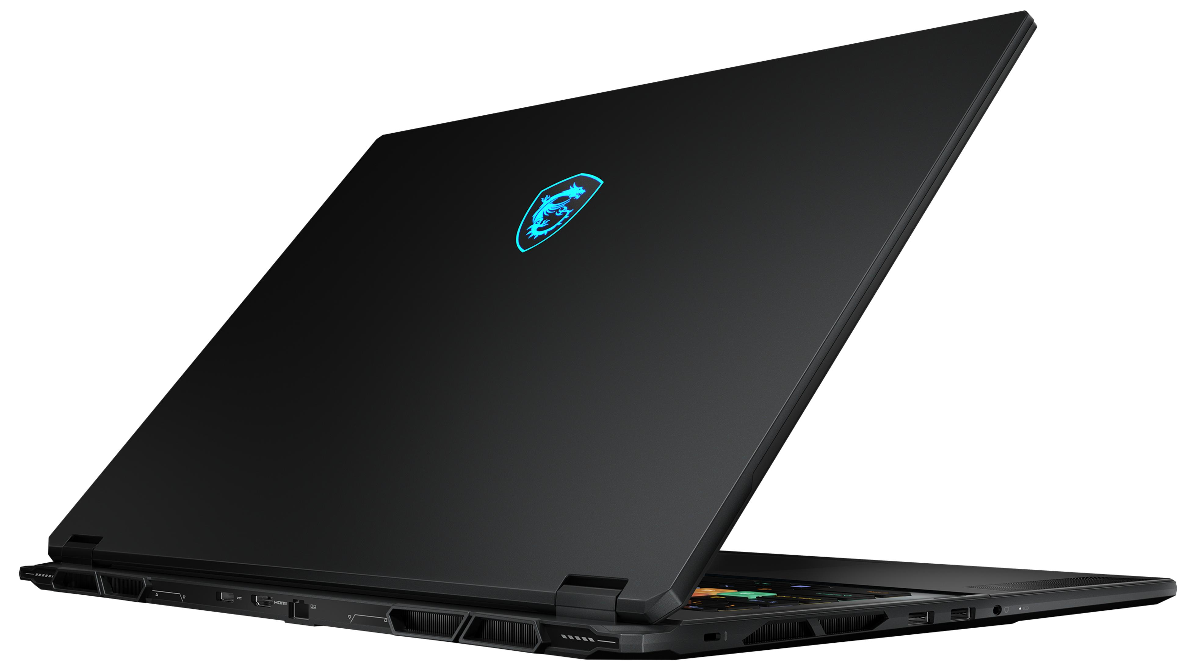 Ordinateur portable noir avec logo dragon MSI bleu lumineux sur le capot.
