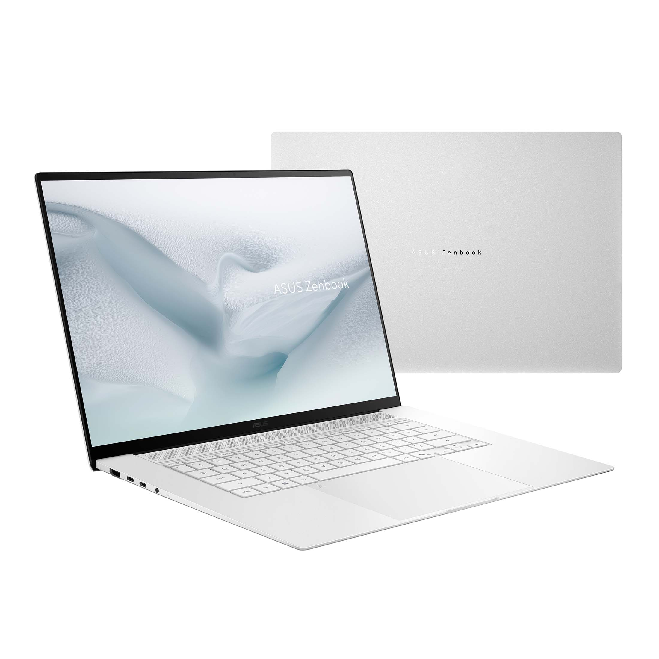 Un ordinateur portable Asus Zenbook blanc et élégant, ouvert, montrant le clavier et l'écran.