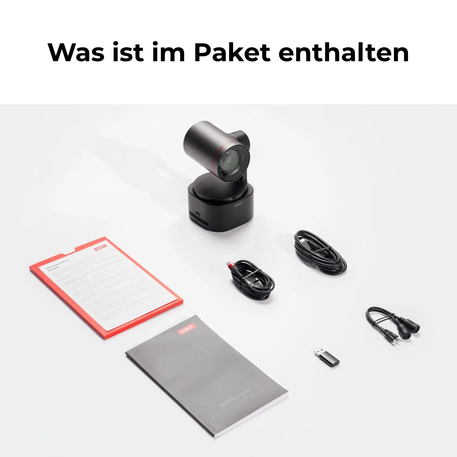 Ein PTZ-Kameraset mit Kabeln, USB-Stick, Anleitung und Garantie.