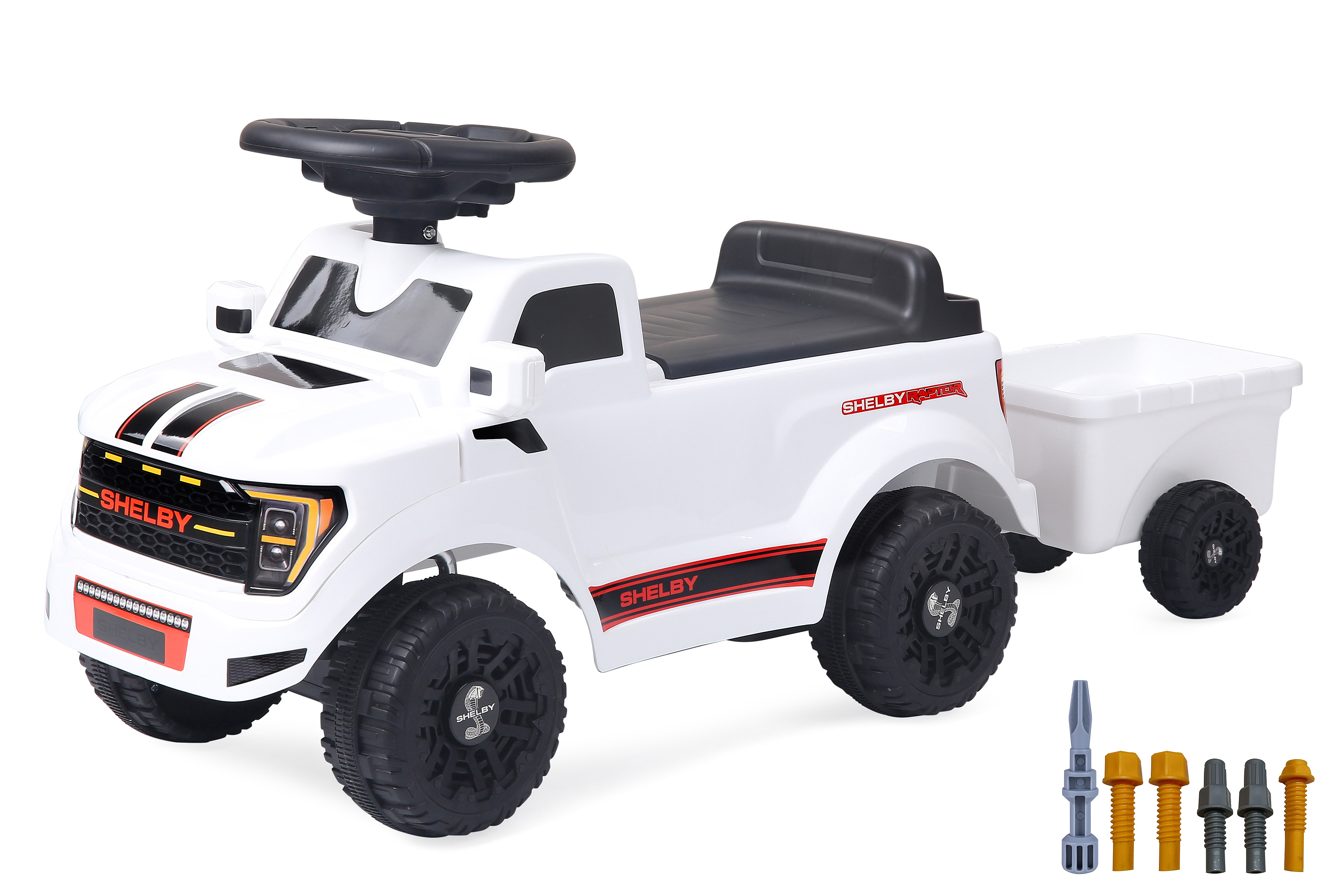 Ein weißes Kinderfahrzeug im Shelby-Raptor-Stil mit Anhänger und Werkzeug.