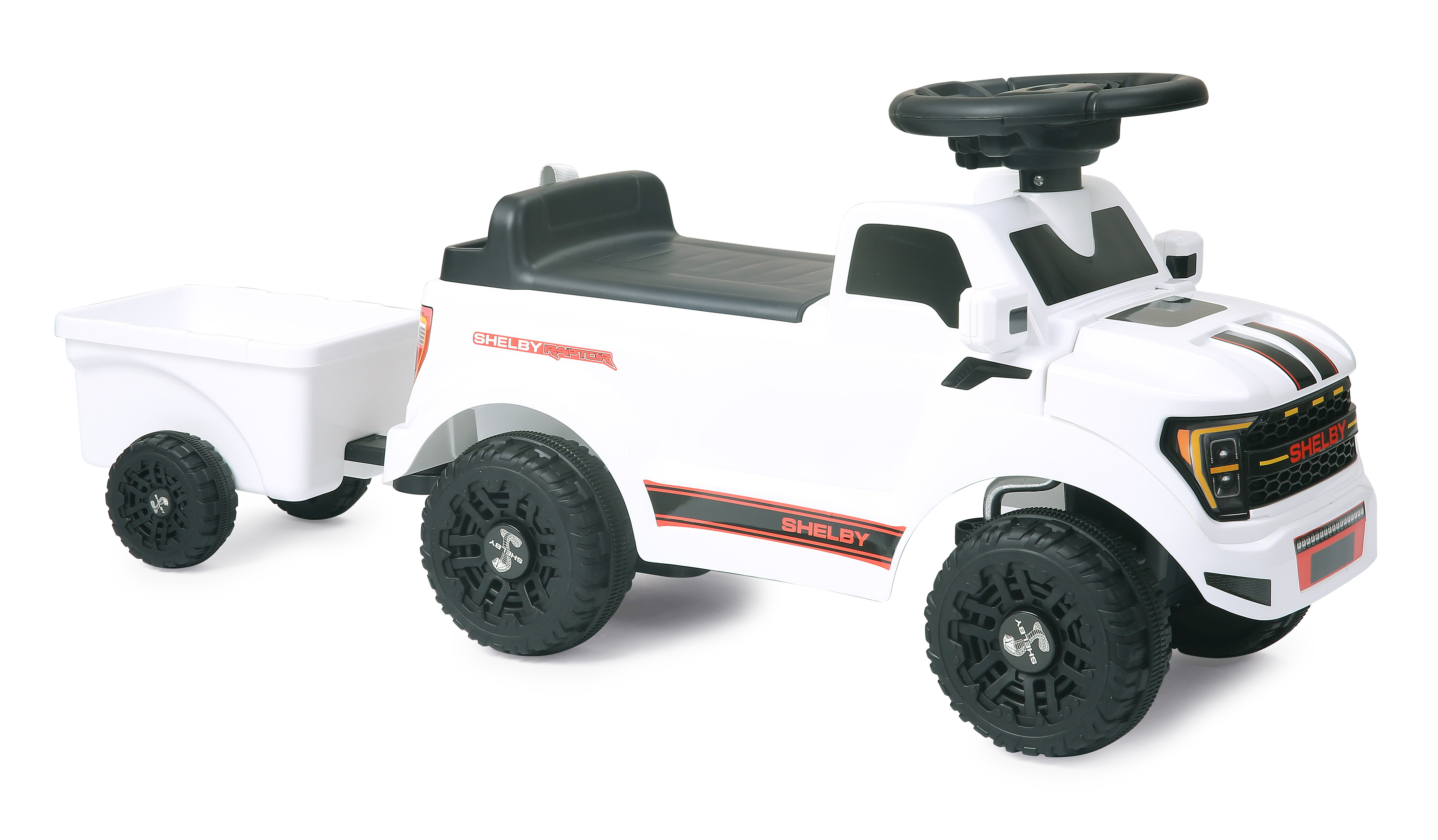 Ein weißes Spielzeugauto mit Anhänger, Modell Shelby Raptor, auf weißem Hintergrund.