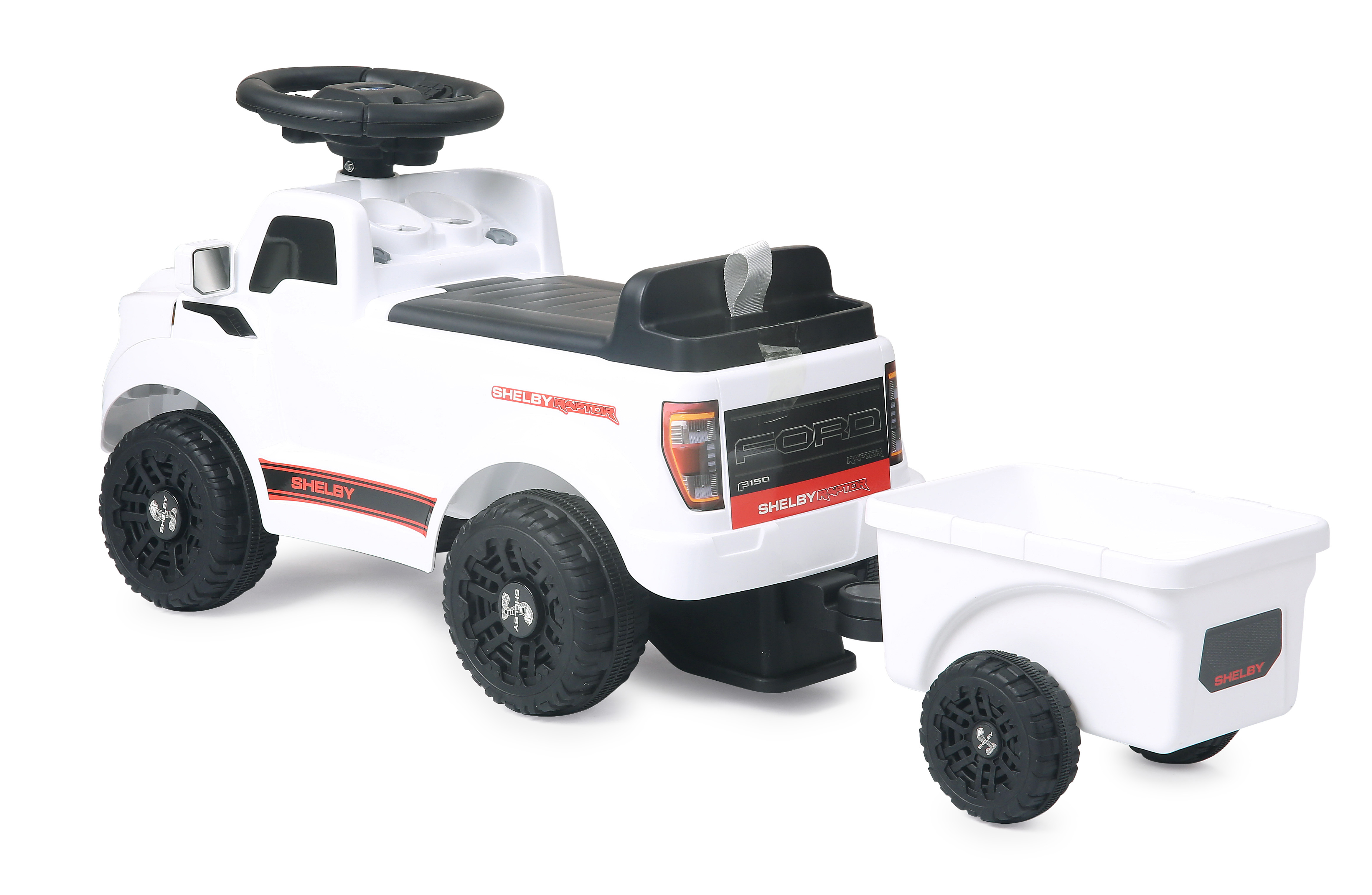 Ein weißes Spielzeug-Pickup mit Anhänger, das einem Ford F-150 Shelby Raptor ähnelt.