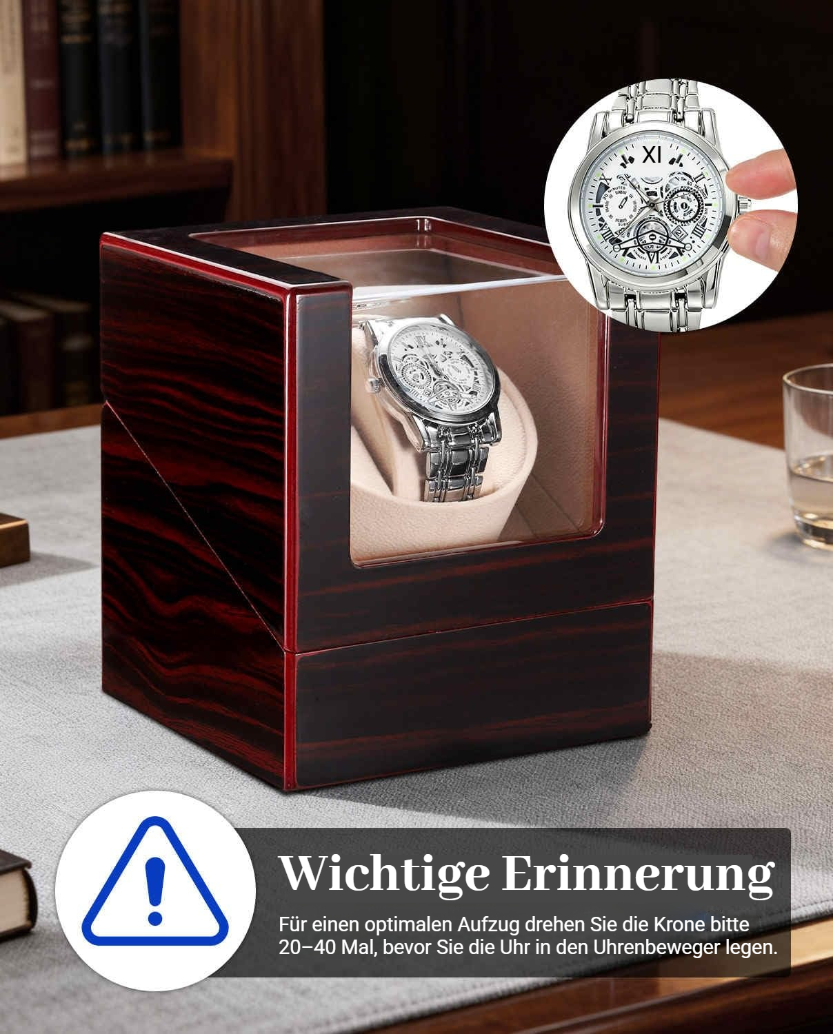 Ein silberner Automatik-Uhrenbeweger mit Holzakzenten und einer Uhr darin.