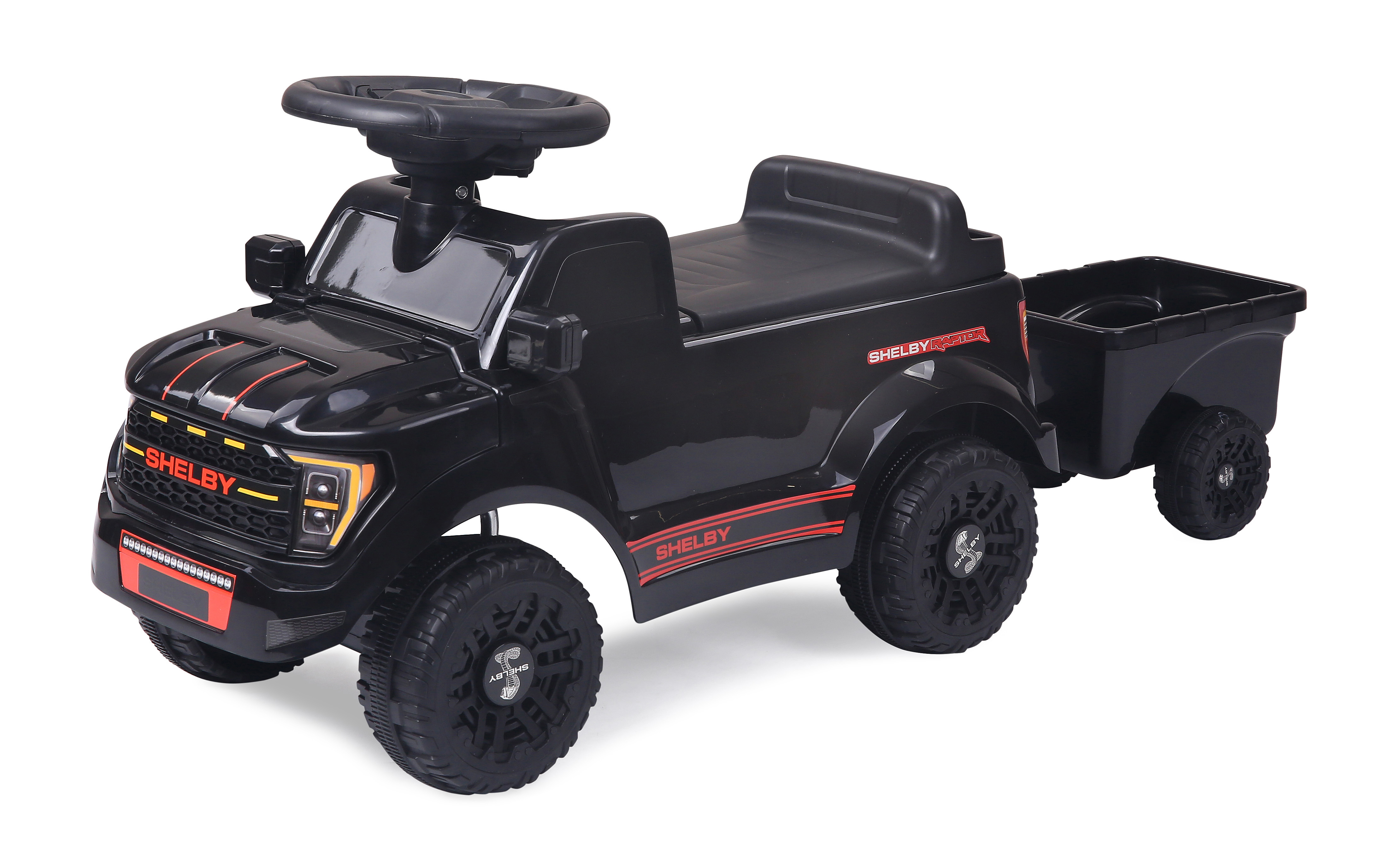 Schwarzes Spielzeugauto mit Anhänger, Shelby Raptor Aufkleber, rote Akzente.