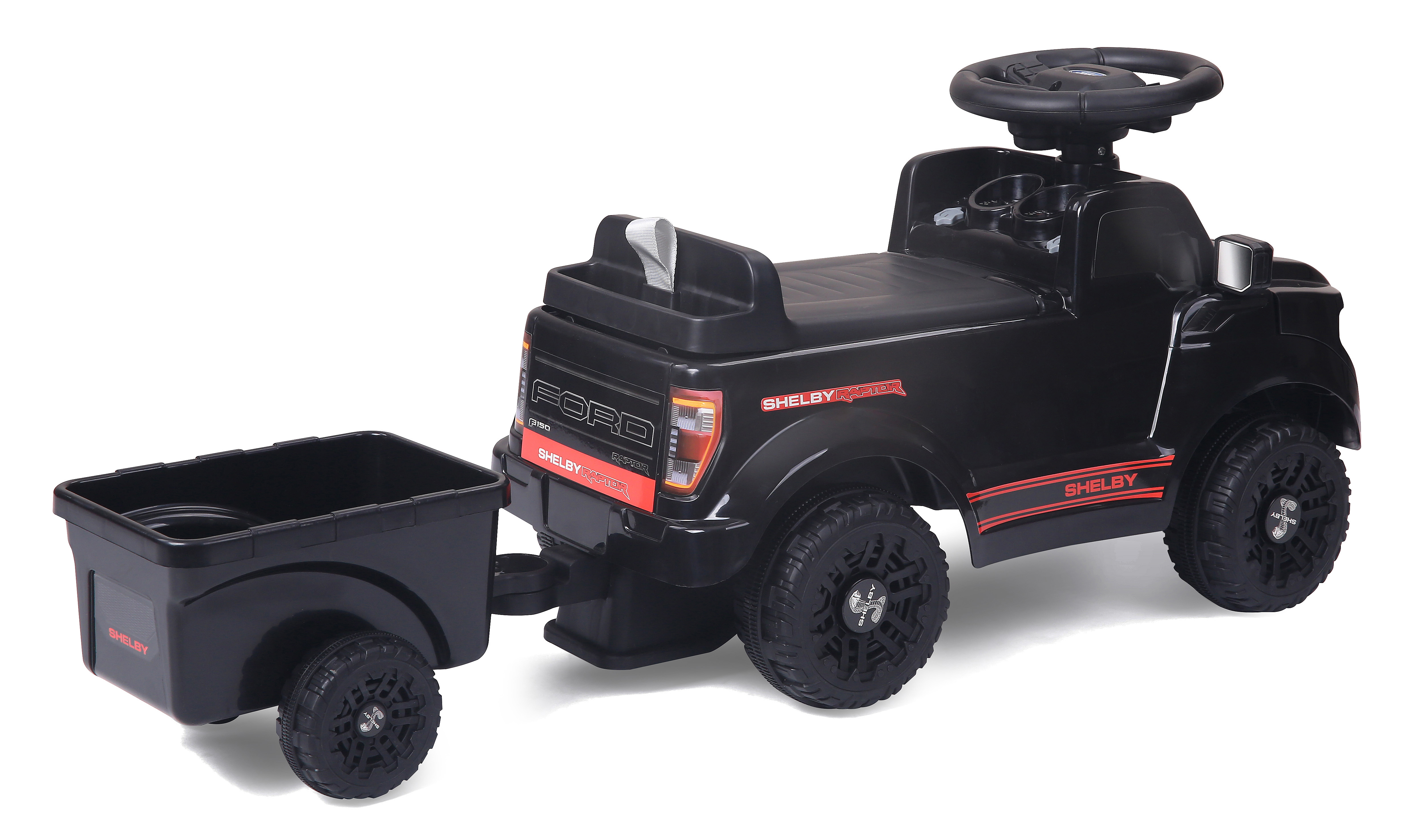 Schwarzer Ford F-150 Shelby Raptor Spielzeug-Pickup mit Anhänger, wei&szlig;er Hintergrund.