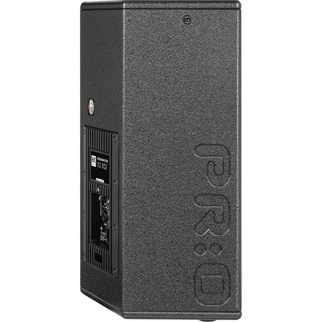 Black speaker with side "PRO" logo and connection panel.