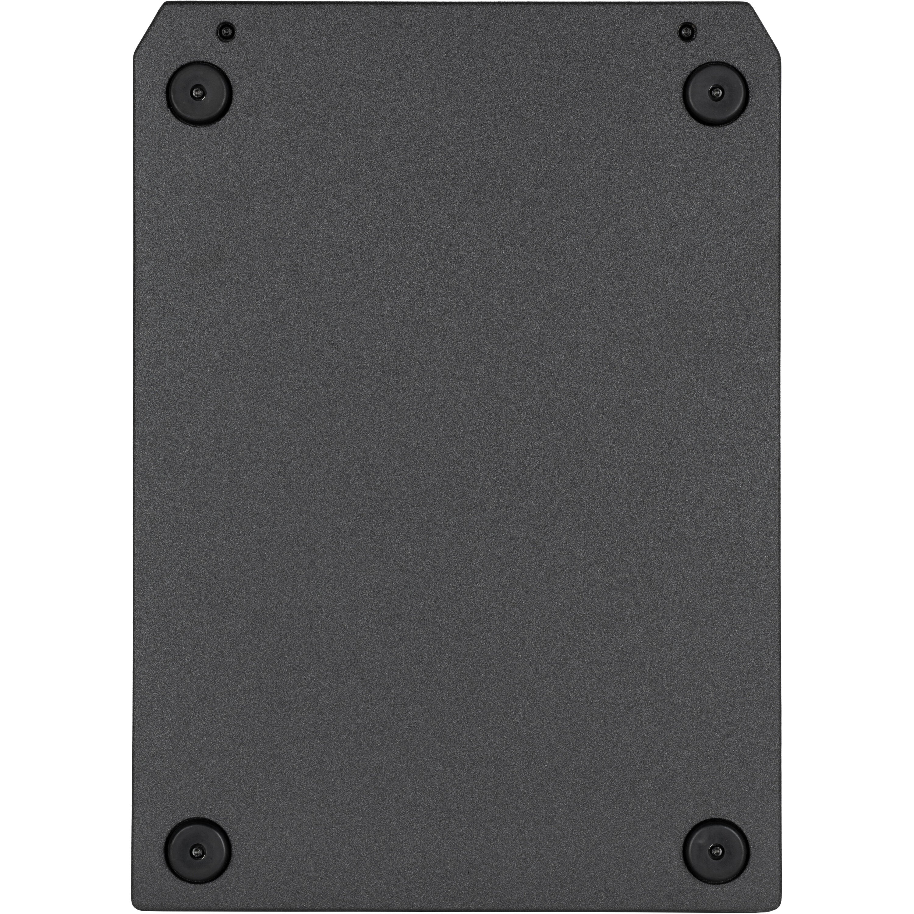 Black rectangular object with four rubber feet at the corners.