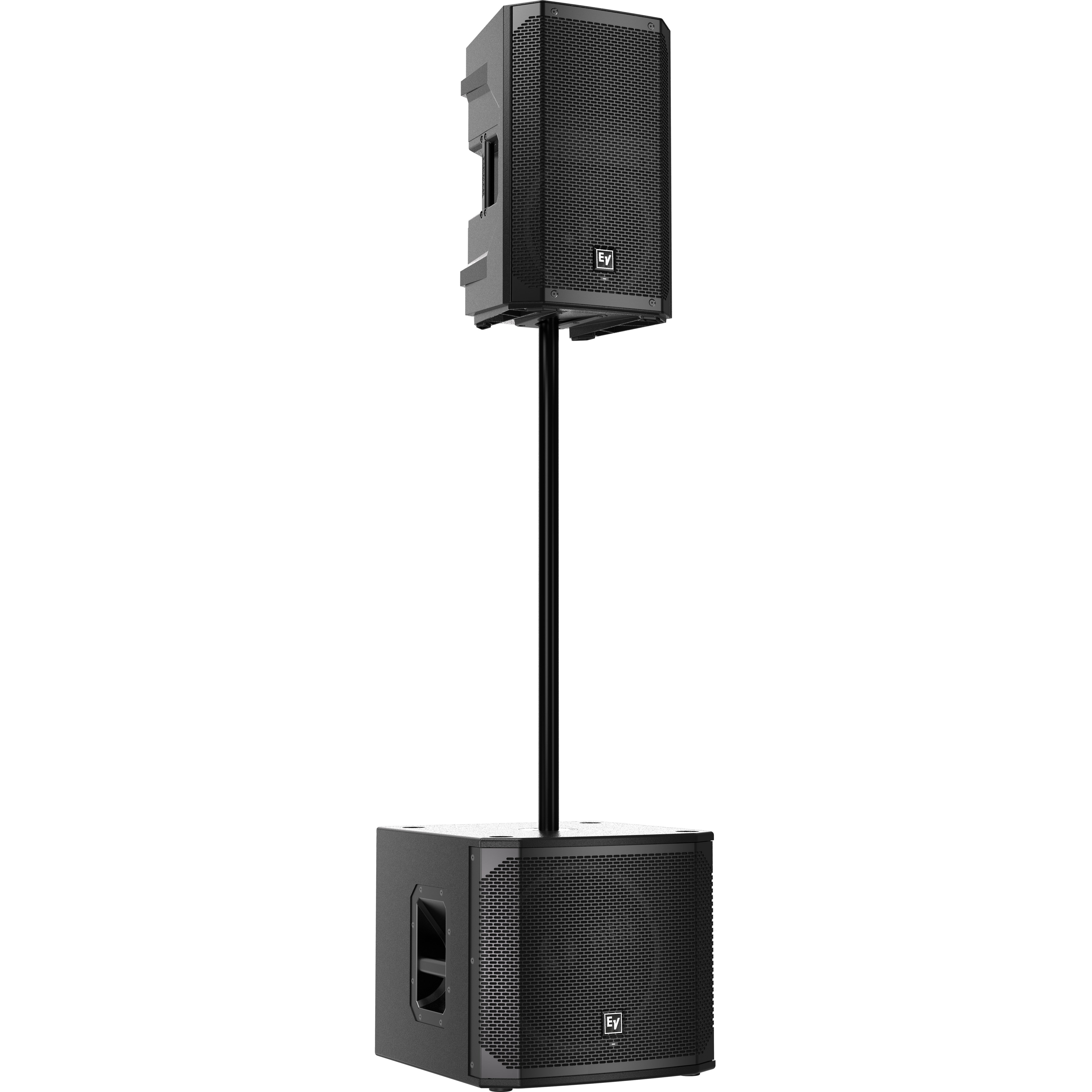 A black subwoofer sits on the floor, with a speaker on a stand above it.